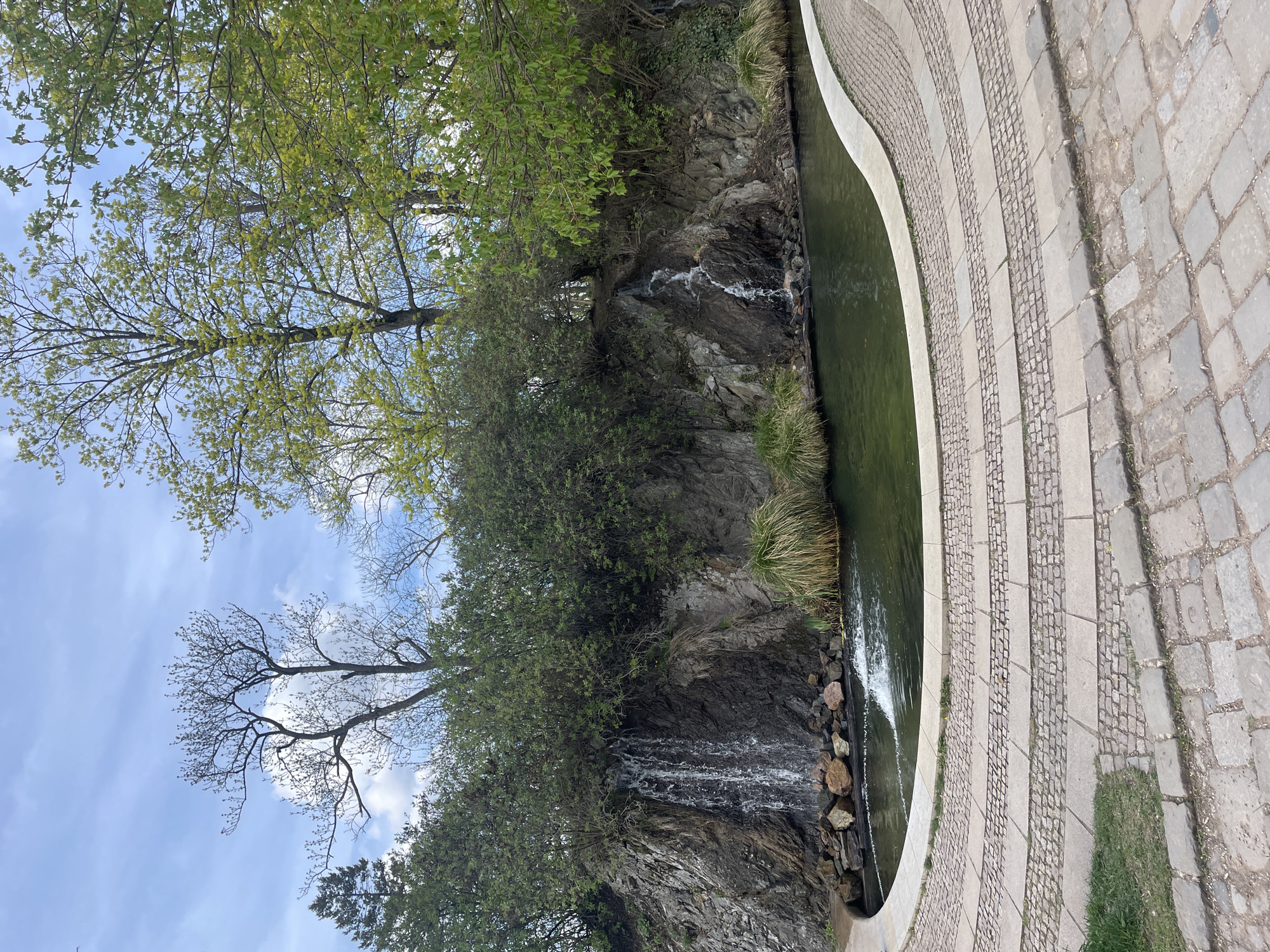 Waterfall and stone walkway documented in Brno, Czechia