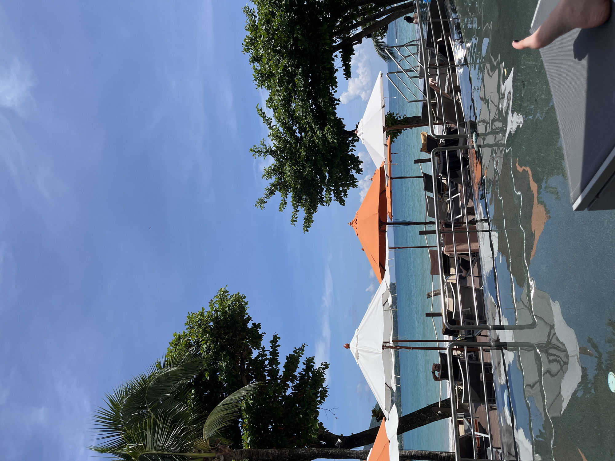 Beach and resort life along Ban Bang Thao on a June morning