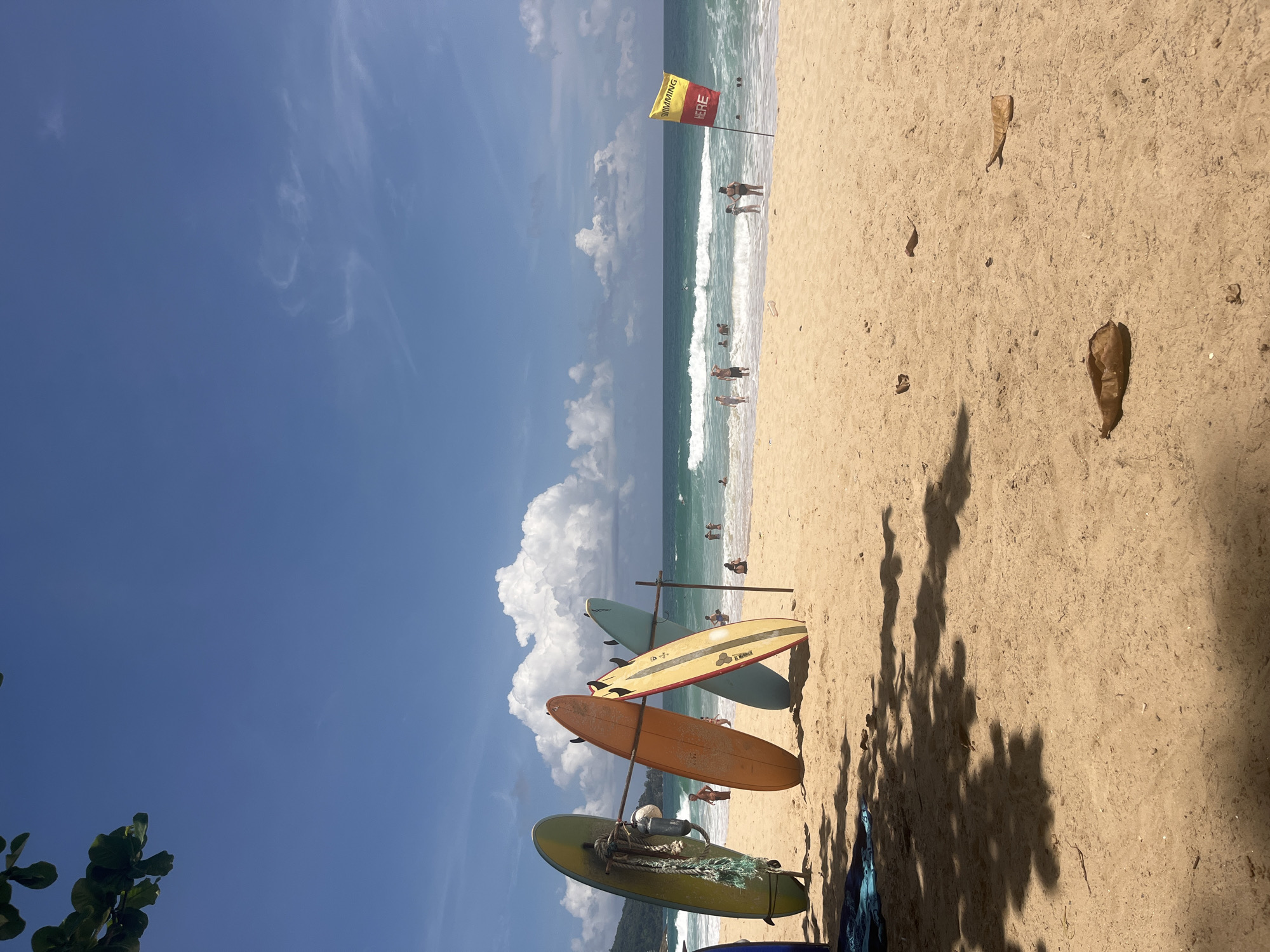 Choeng Thale beach morning: surf, strong currents, and coconuts