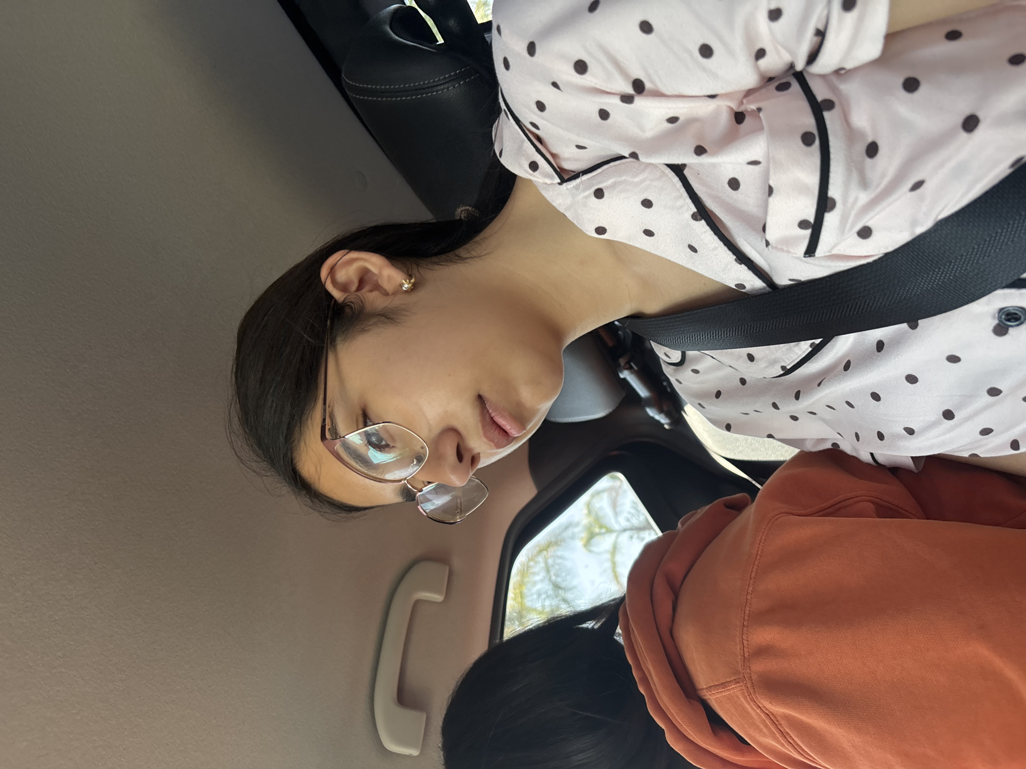 Woman in polka dot pajamas observed in car in Mexico