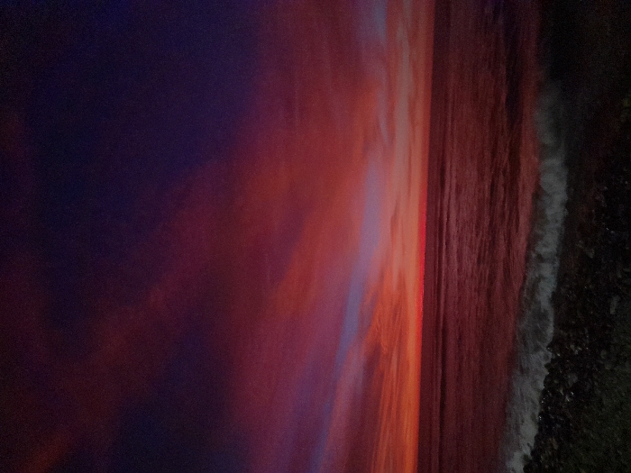 Vibrant sunset captured over ocean in Huanchaco, Peru