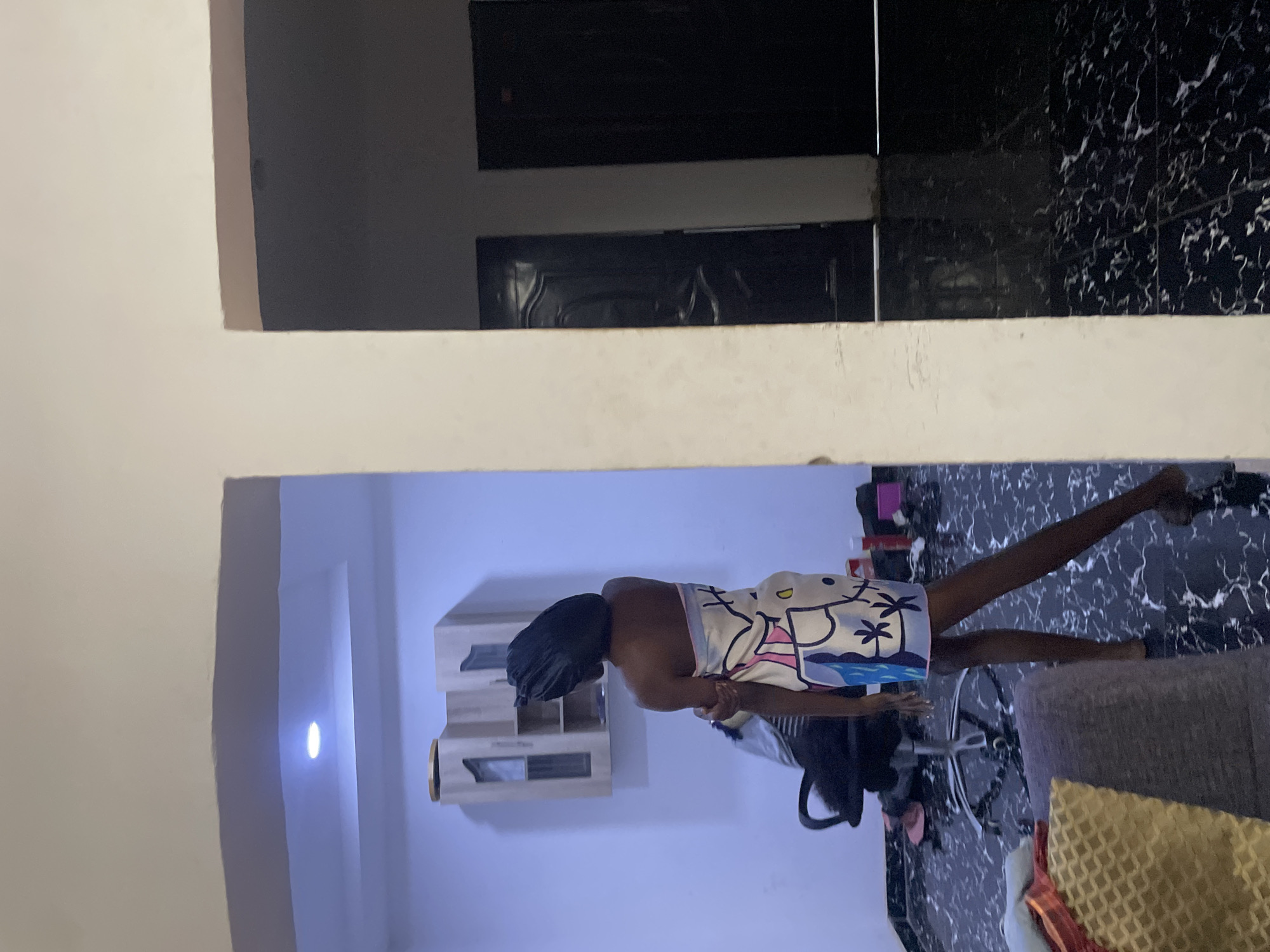 Sunset evening in an Abuja home, inside and out