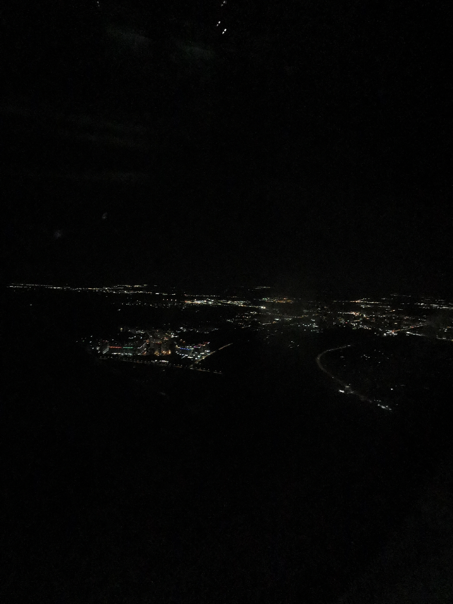 Nighttime aerial views captured over Khimki during aircraft flight
