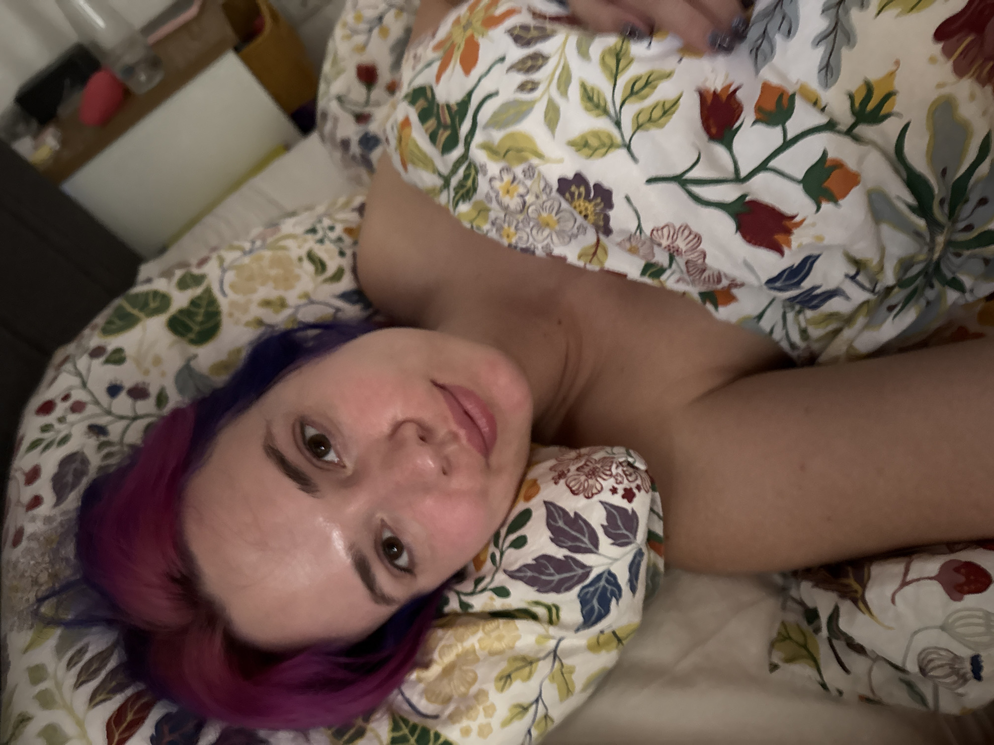 Woman photographed in bed in Zagreb morning scene