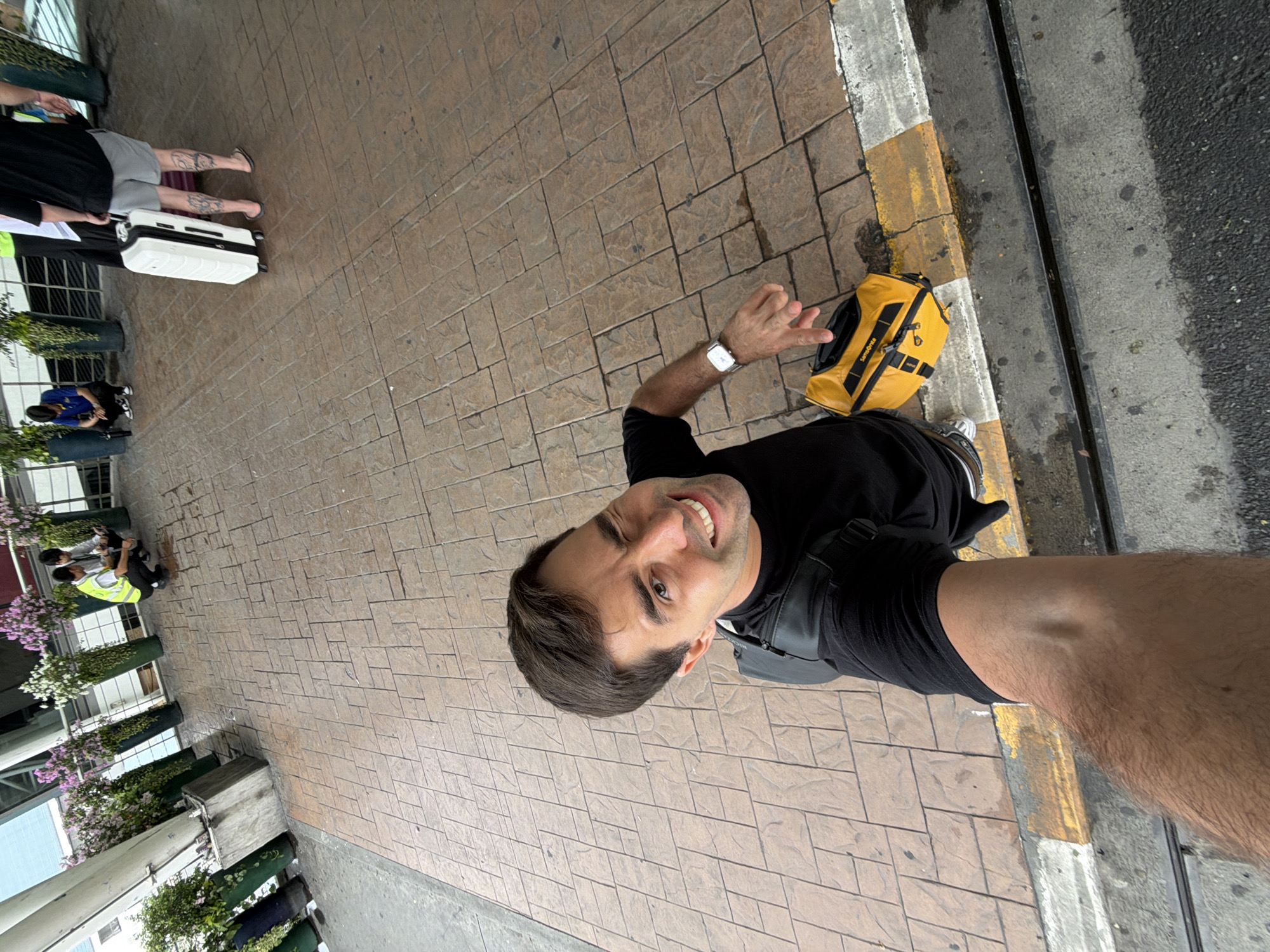 Man takes early morning selfie with luggage in Sakhu