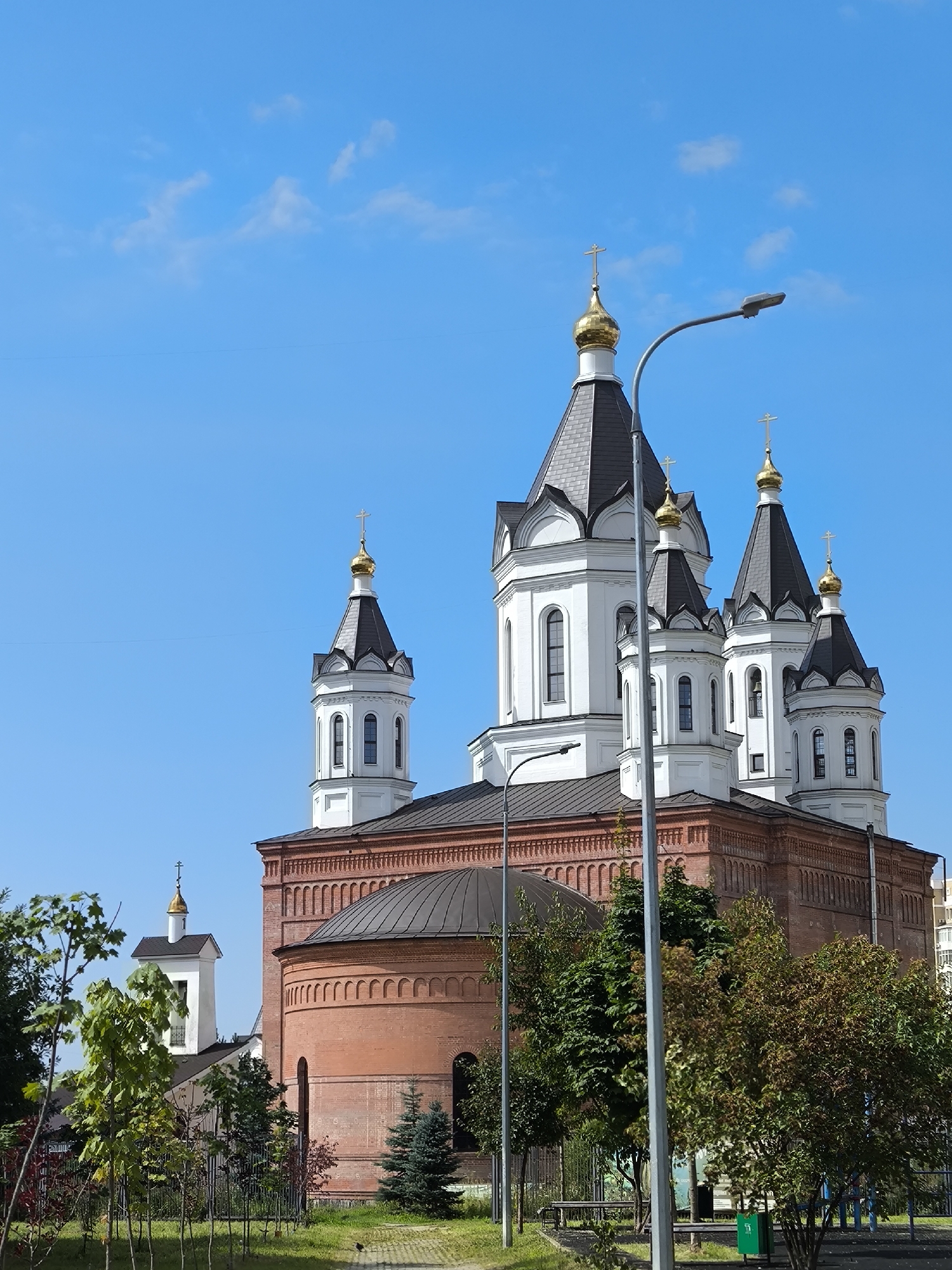 Orthodox church with golden domes stands bright in Kropotkin, Russia