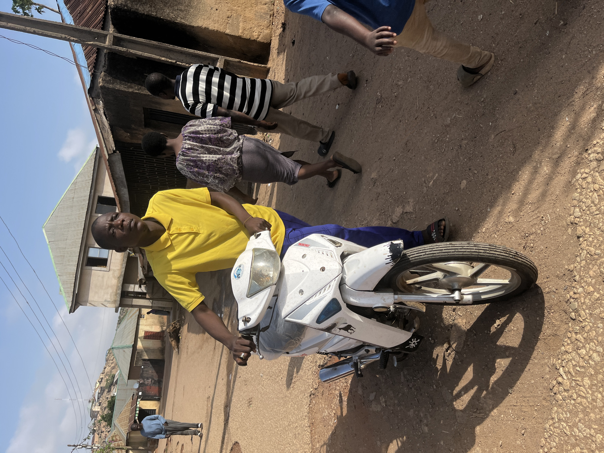 Morning street life documented across Jos, Nigeria neighborhoods
