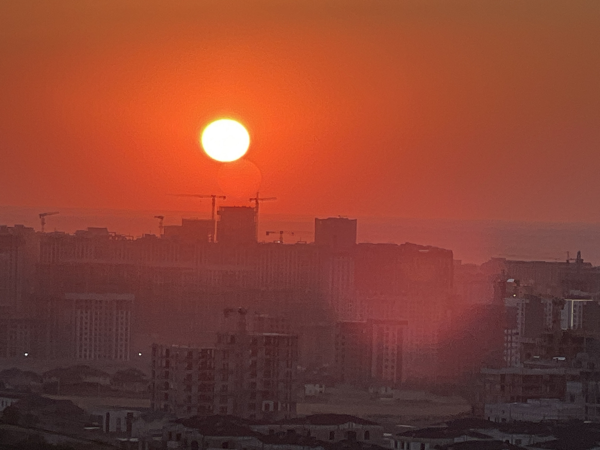 Sunset over Kok Jar paints the Kyrgyz skyline orange