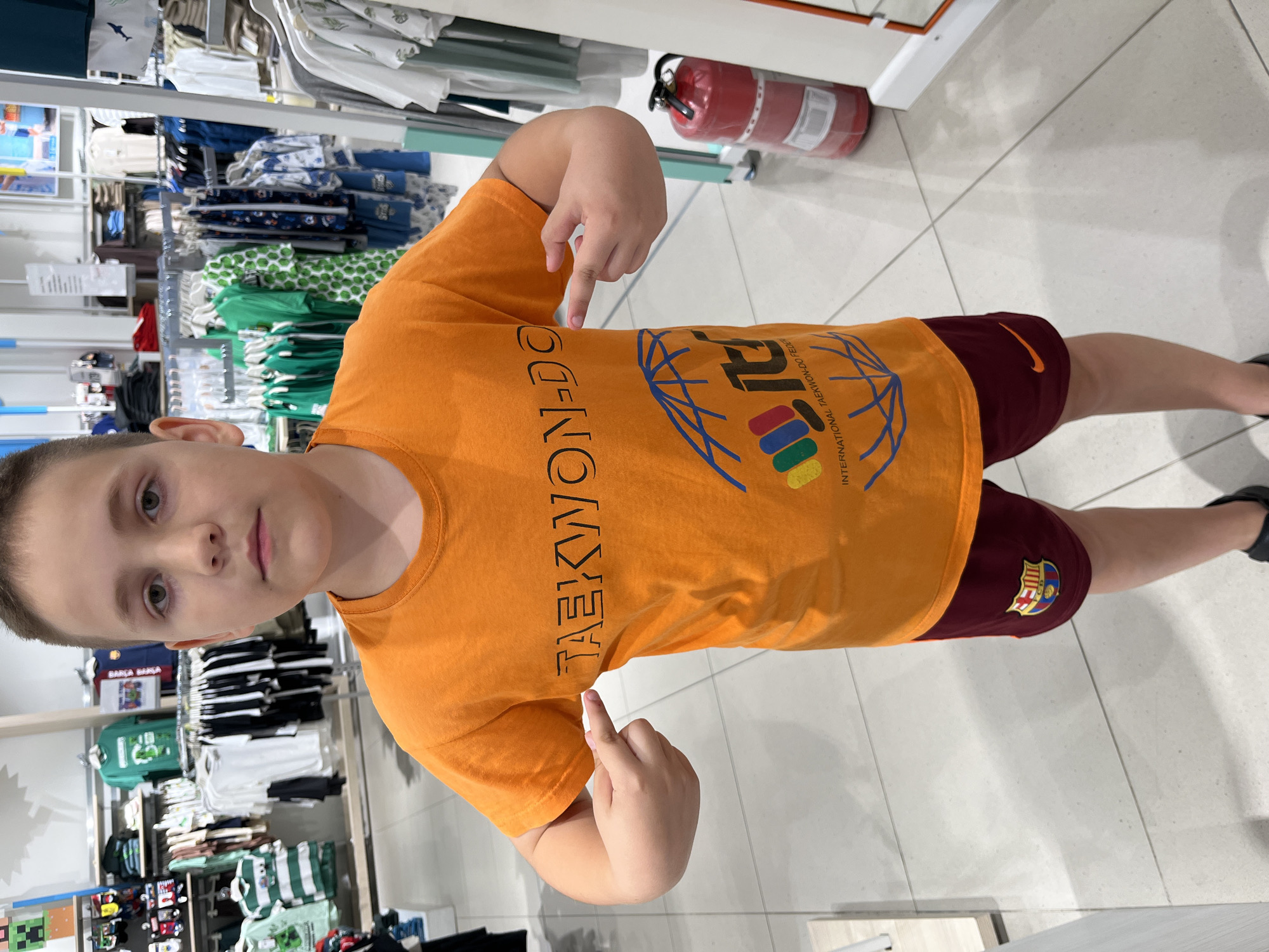 Browsing kids' clothes and Puma gear at a Kharkiv mall