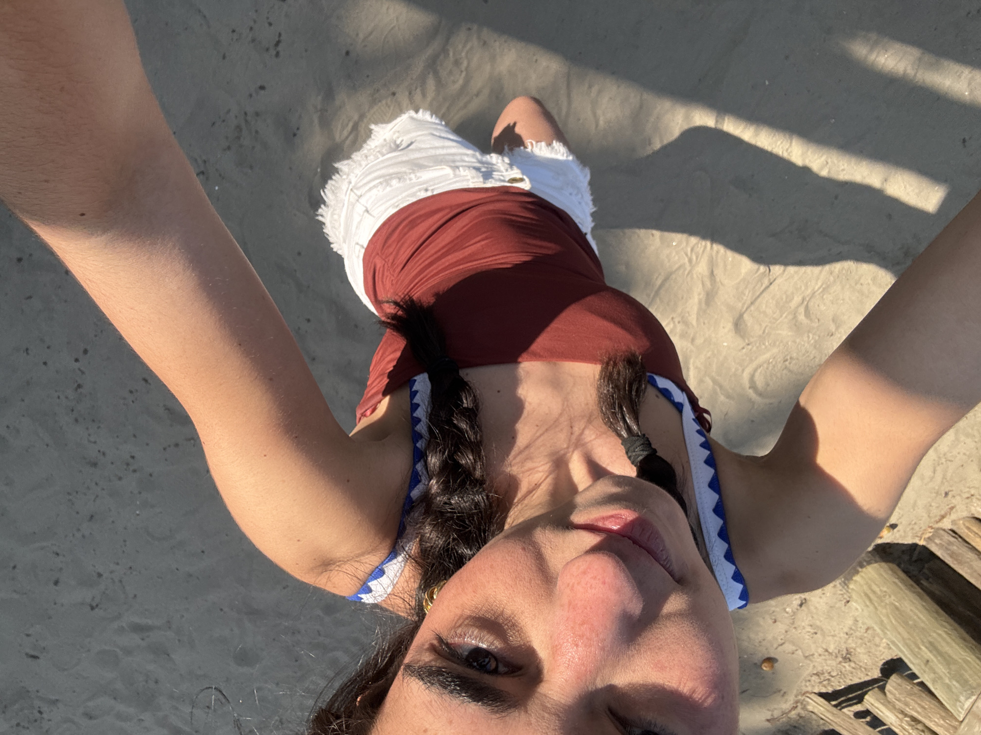 Beach scenes with palm trees and relaxing visitors captured