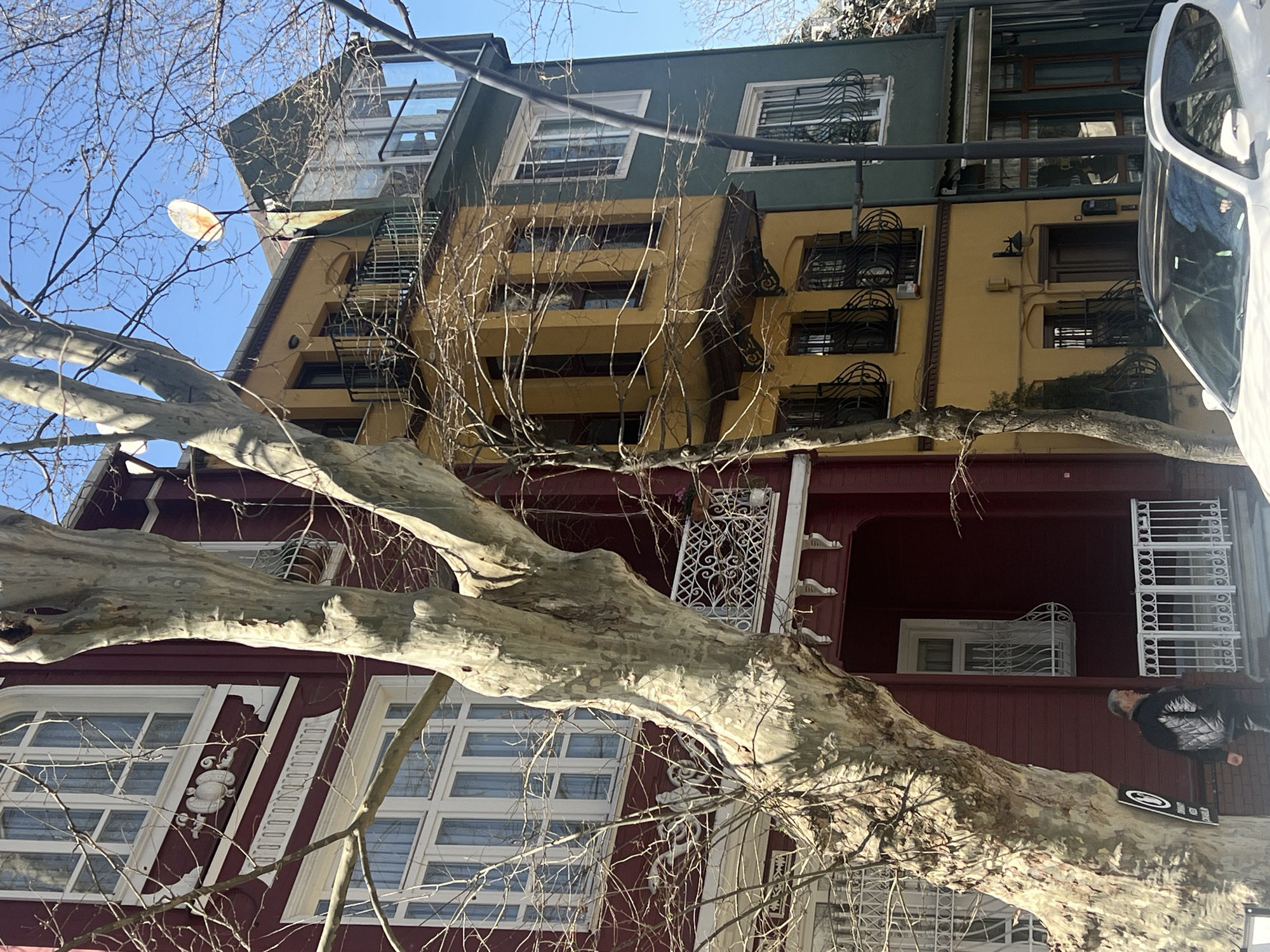 Multi-story building with diverse architecture documented in Istanbul
