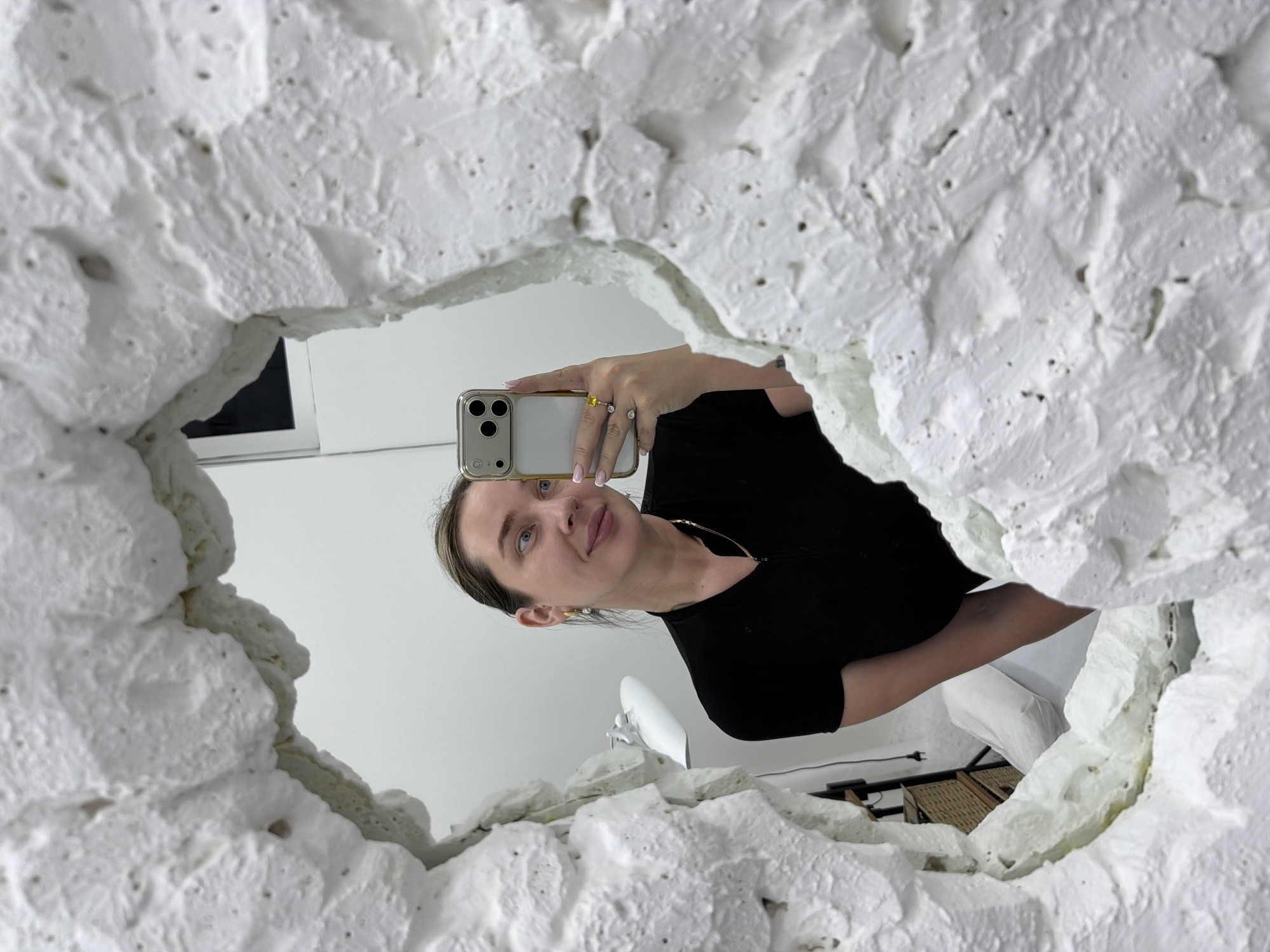Woman takes mirror selfie in Moscow apartment