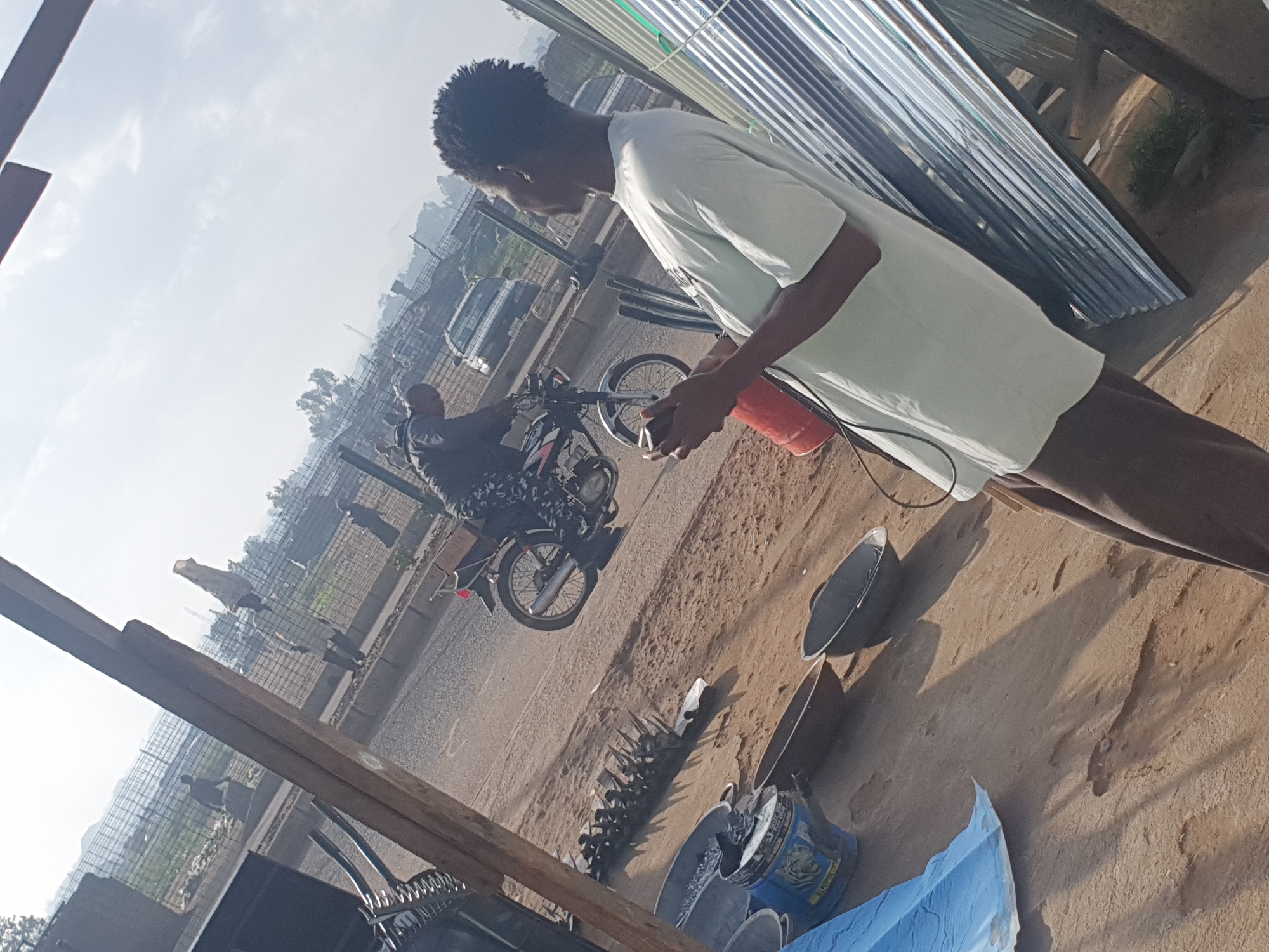 Morning street life unfolds in Bukuru, Nigeria
