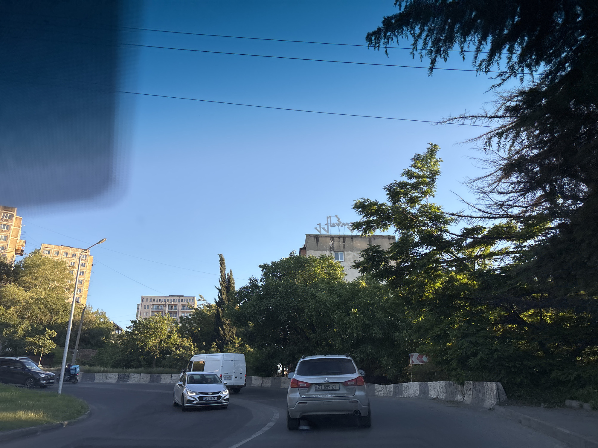 Routine street scenes documented during afternoon drive through Tbilisi