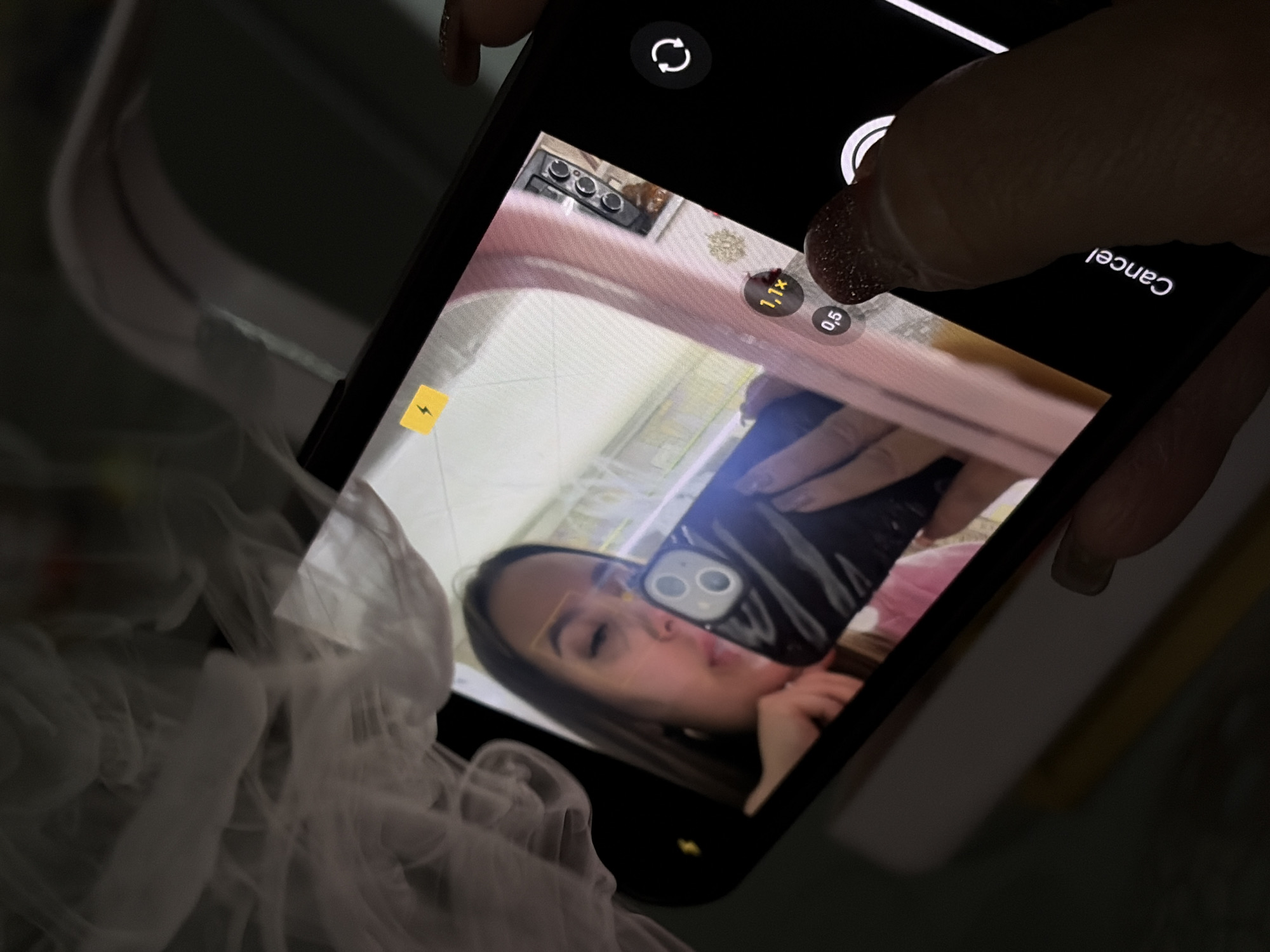 Woman documents selfie session with vaping in Port-Katon, Russia