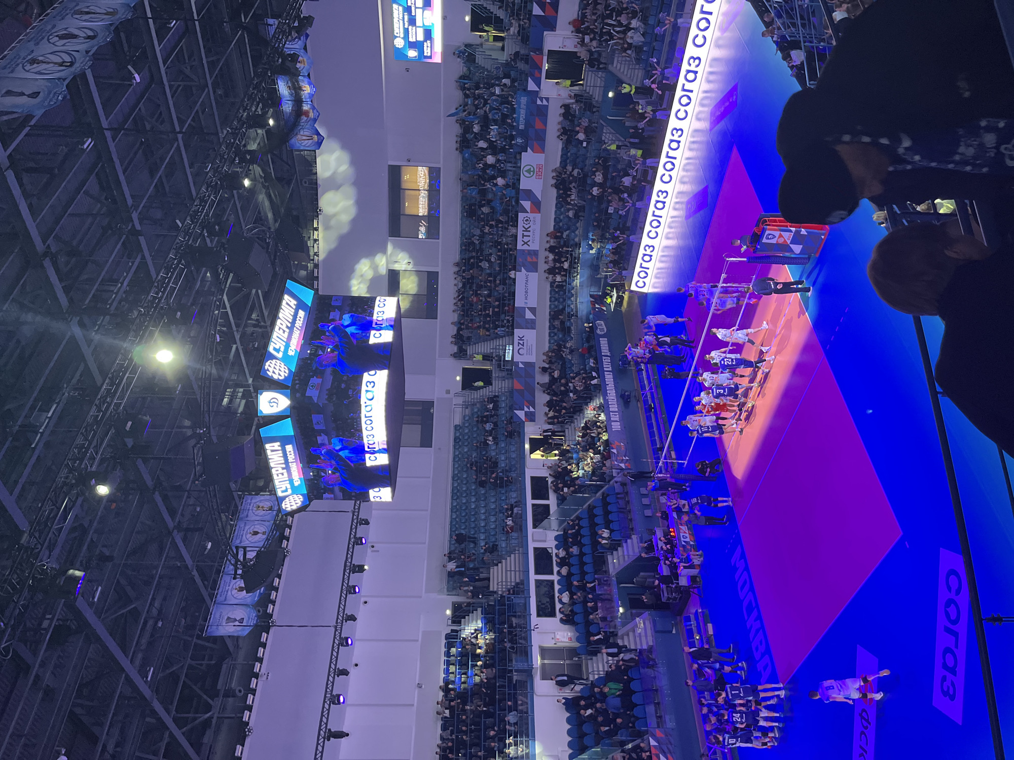 Man poses at height chart near Moscow Dynamo Arena