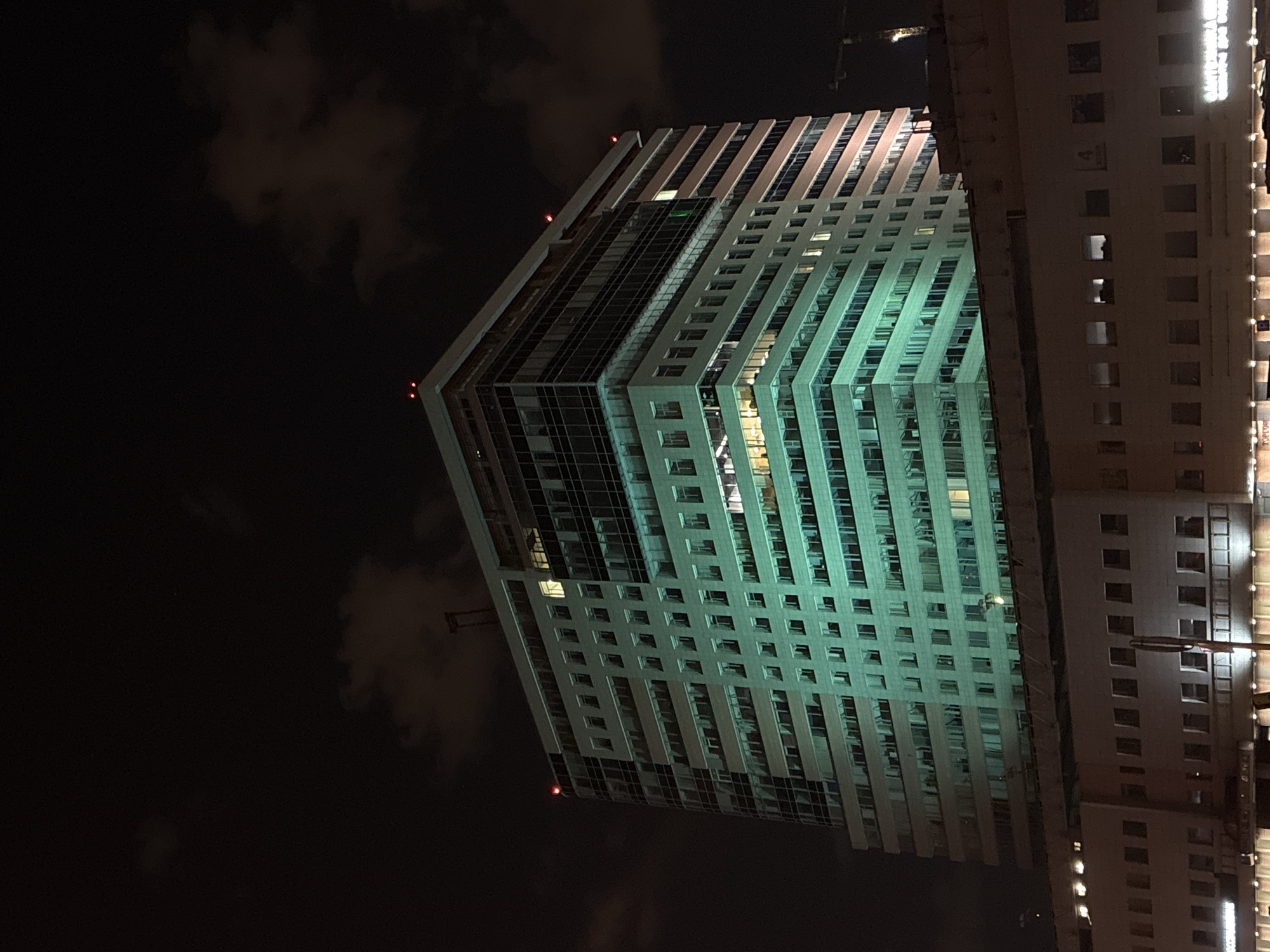 Moscow high-rise buildings illuminated during nighttime hours