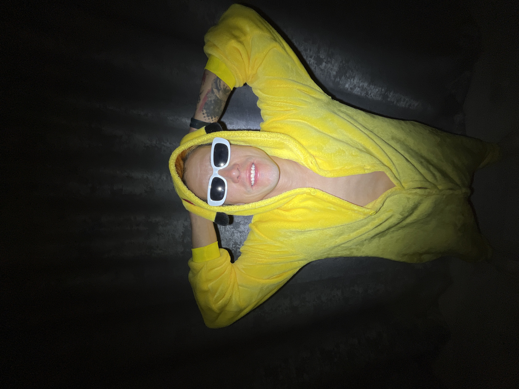 Person in Pikachu costume photographed with cats in Russia