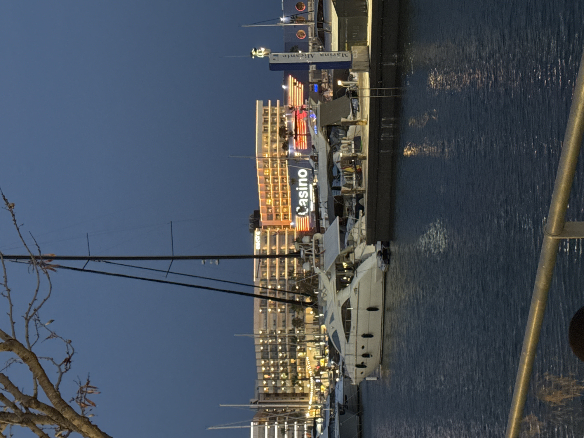 Alicante marina and streets at dusk, falla installation visible