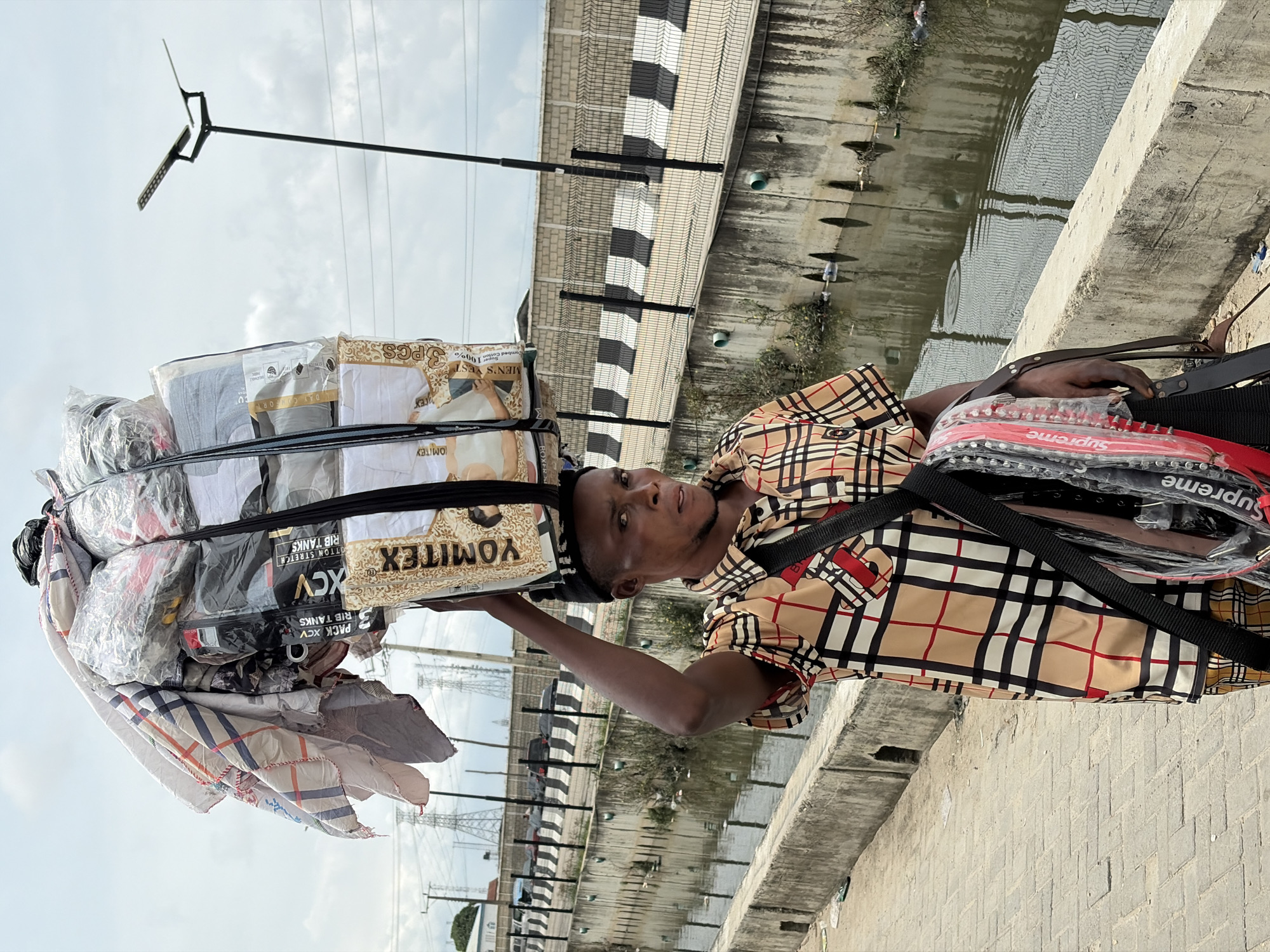 Everyday street activity in Igboefon, Lagos midday