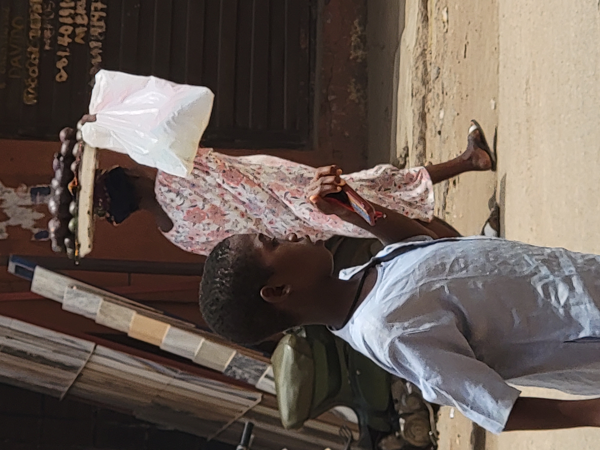 Daily life unfolds on sunny Maiburiji streets and markets