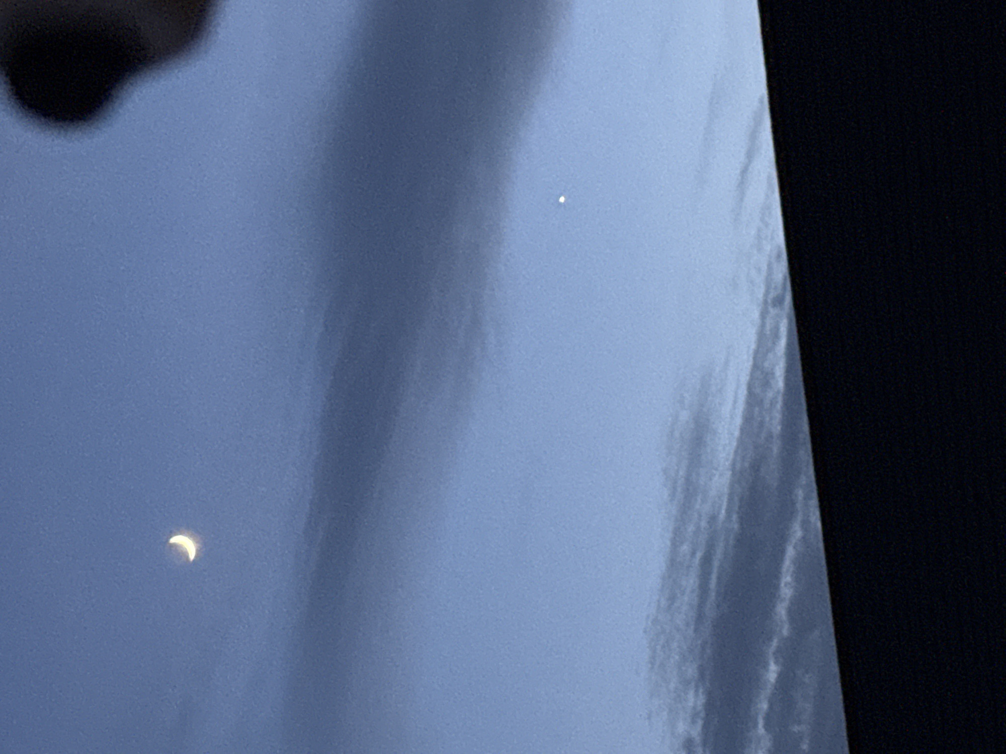Twilight moon and urban lights observed in Great Yarmouth