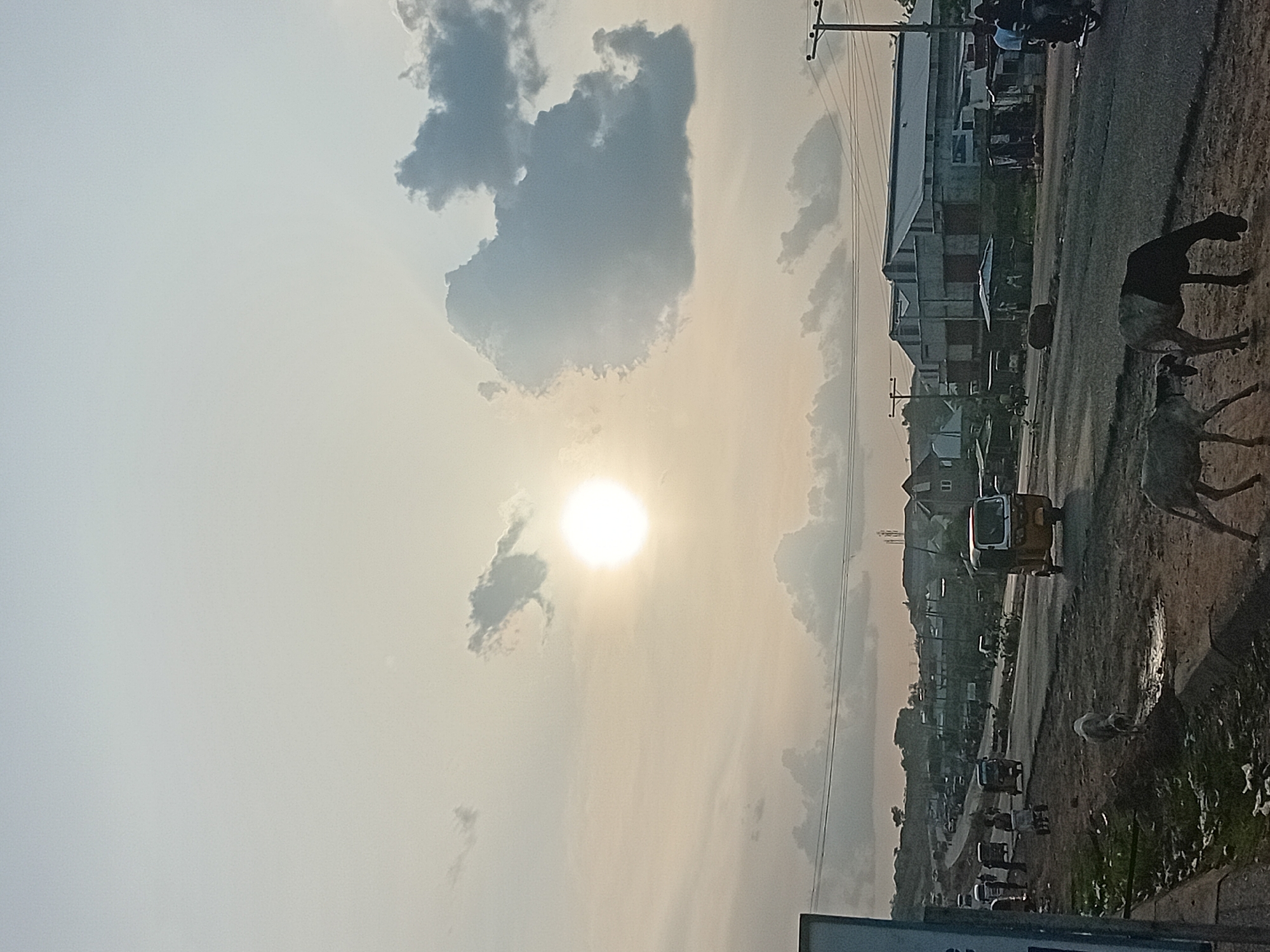 Late afternoon street life documented in Lokoja, Nigeria