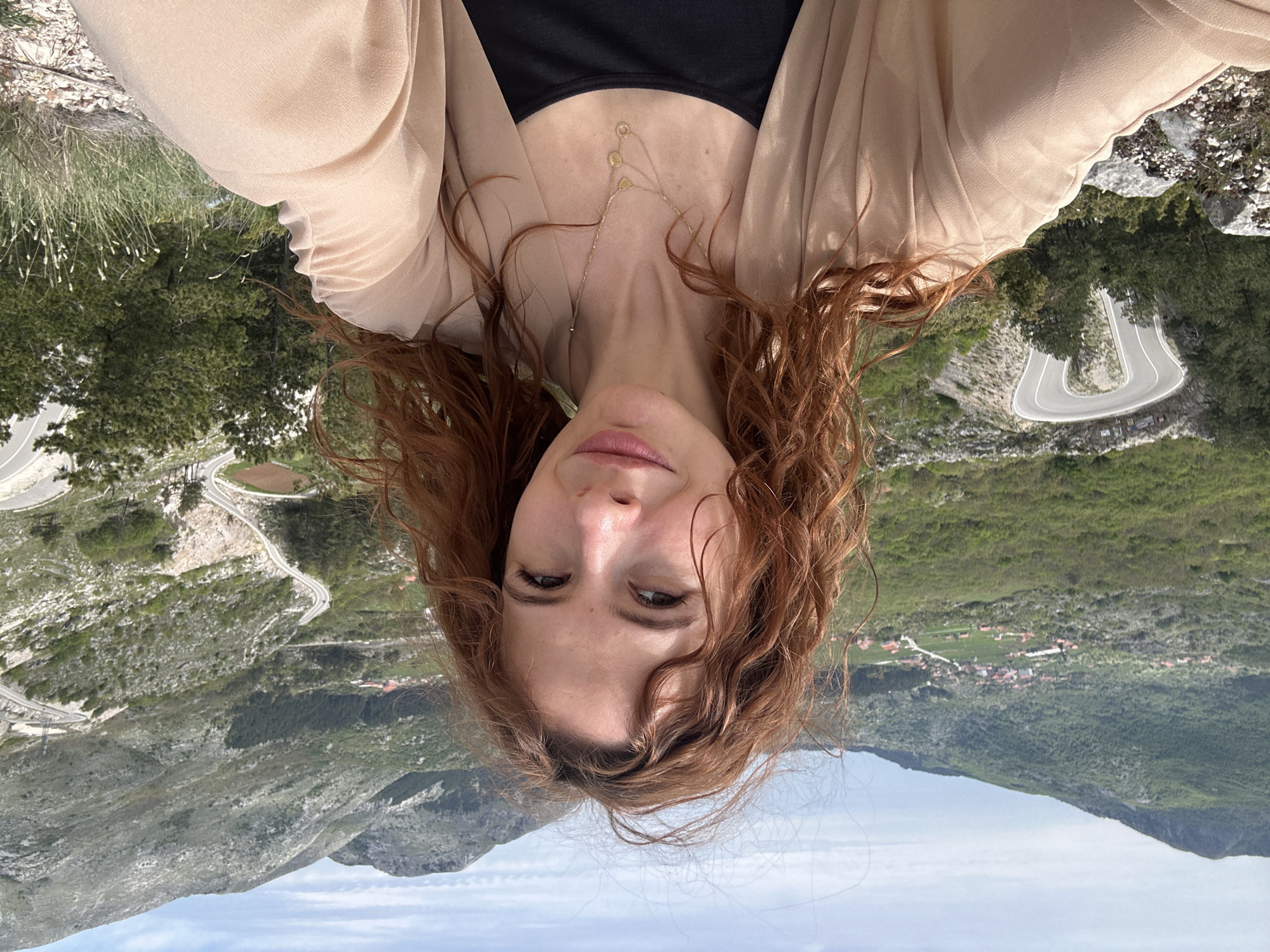 Woman photographed in mountainous landscape in Bukovica, Montenegro