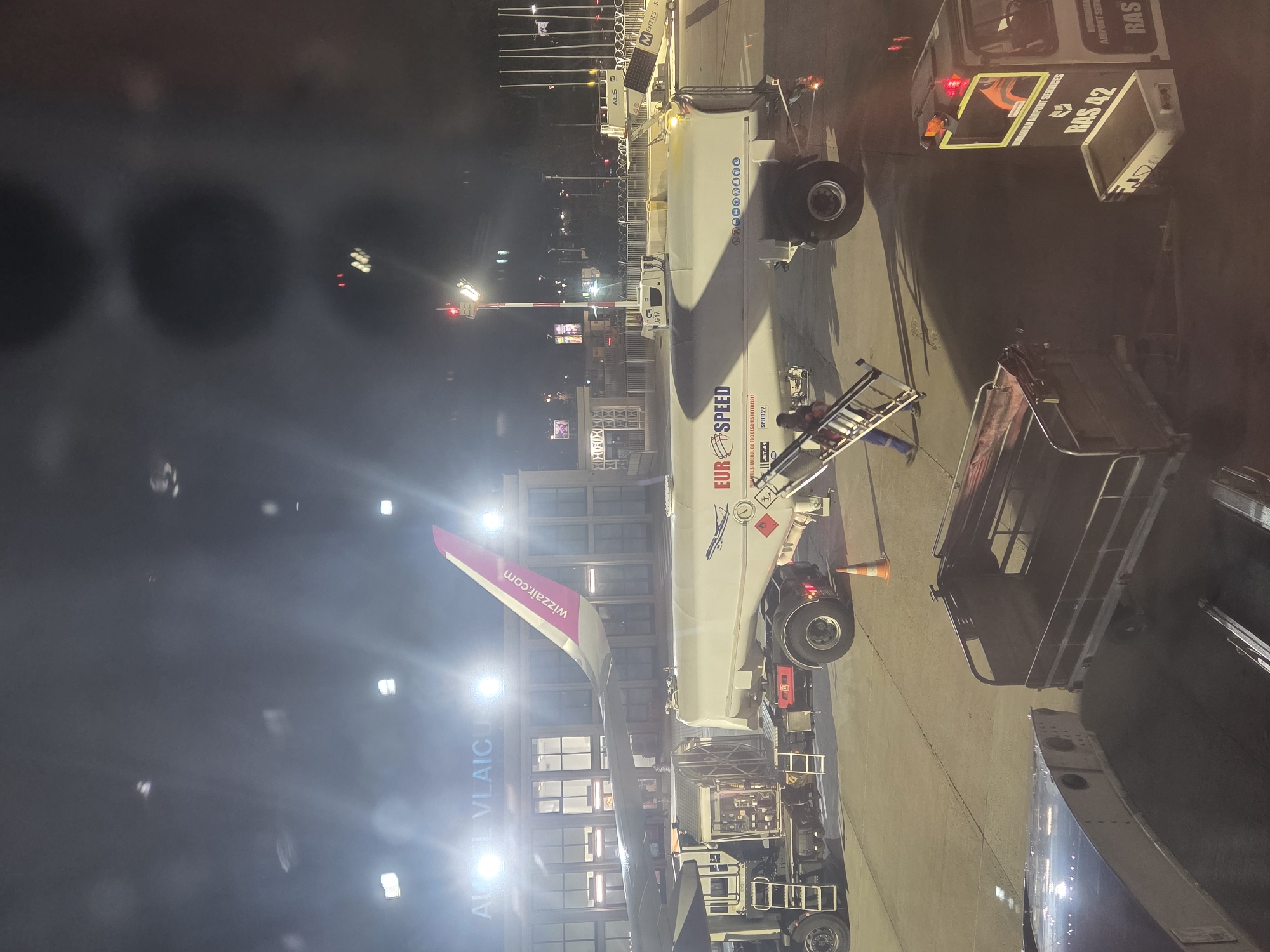 Evening flight operations captured at Bucharest's main airport