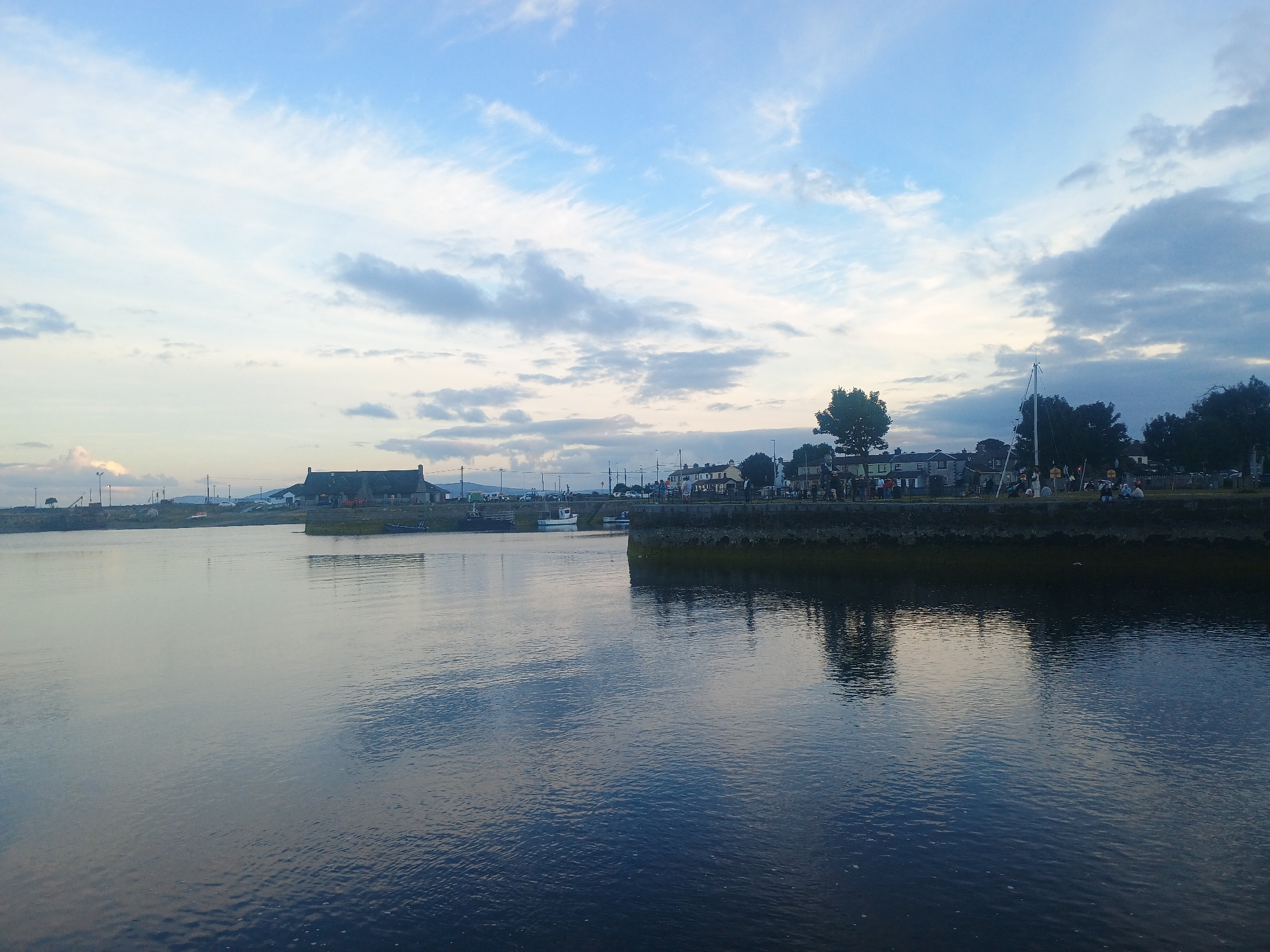 Seagulls and still water along a European waterfront
