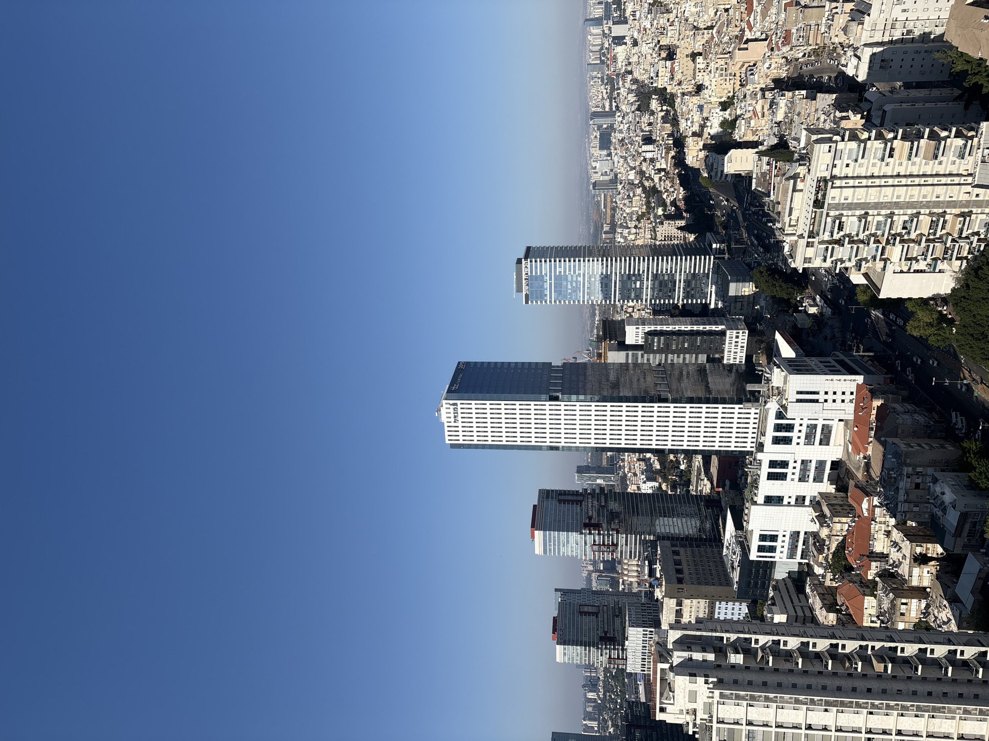 Women take selfie on sunny Ramat Gan balcony