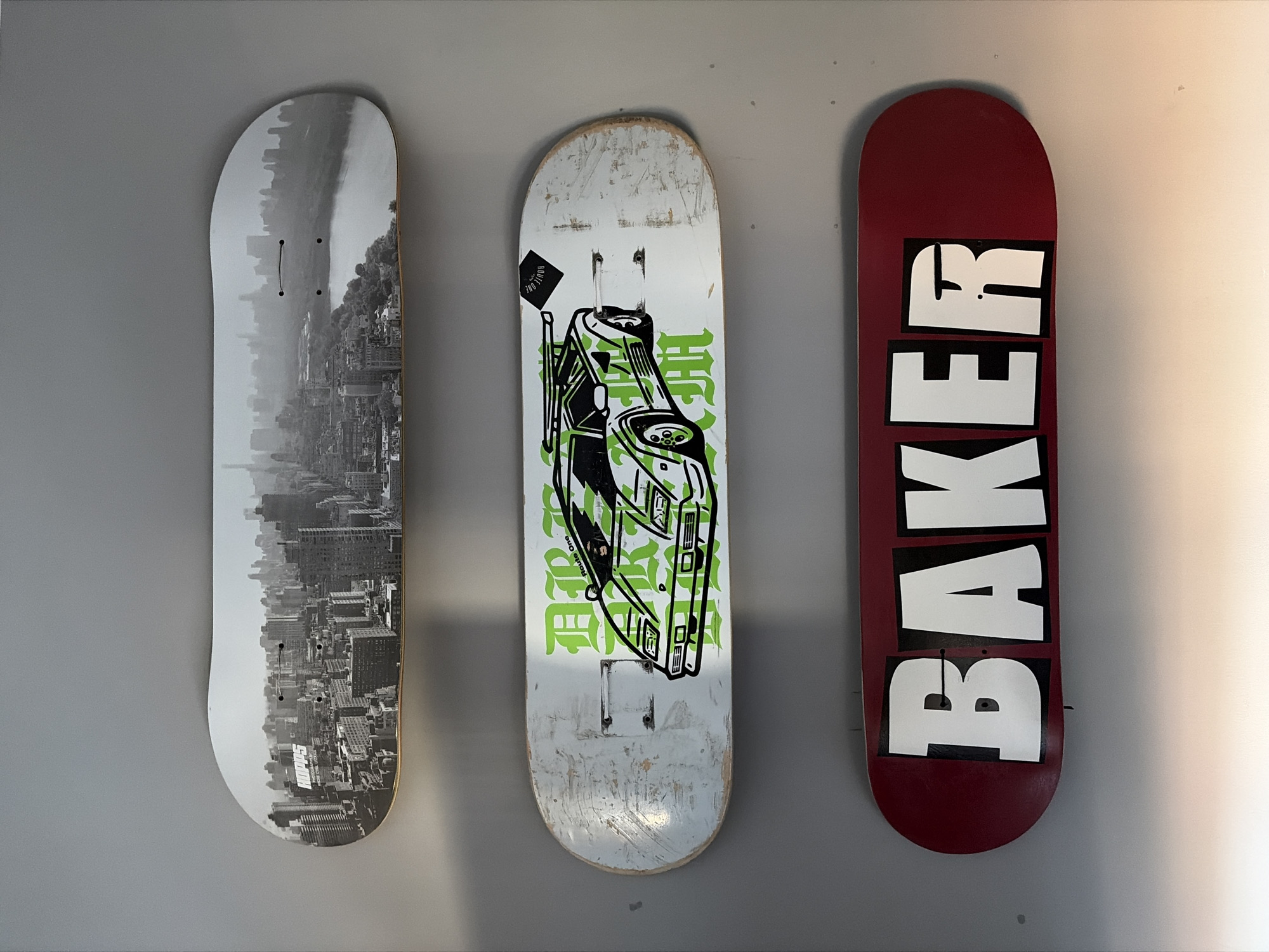 Decorative skateboards mounted on wall in East Suffolk