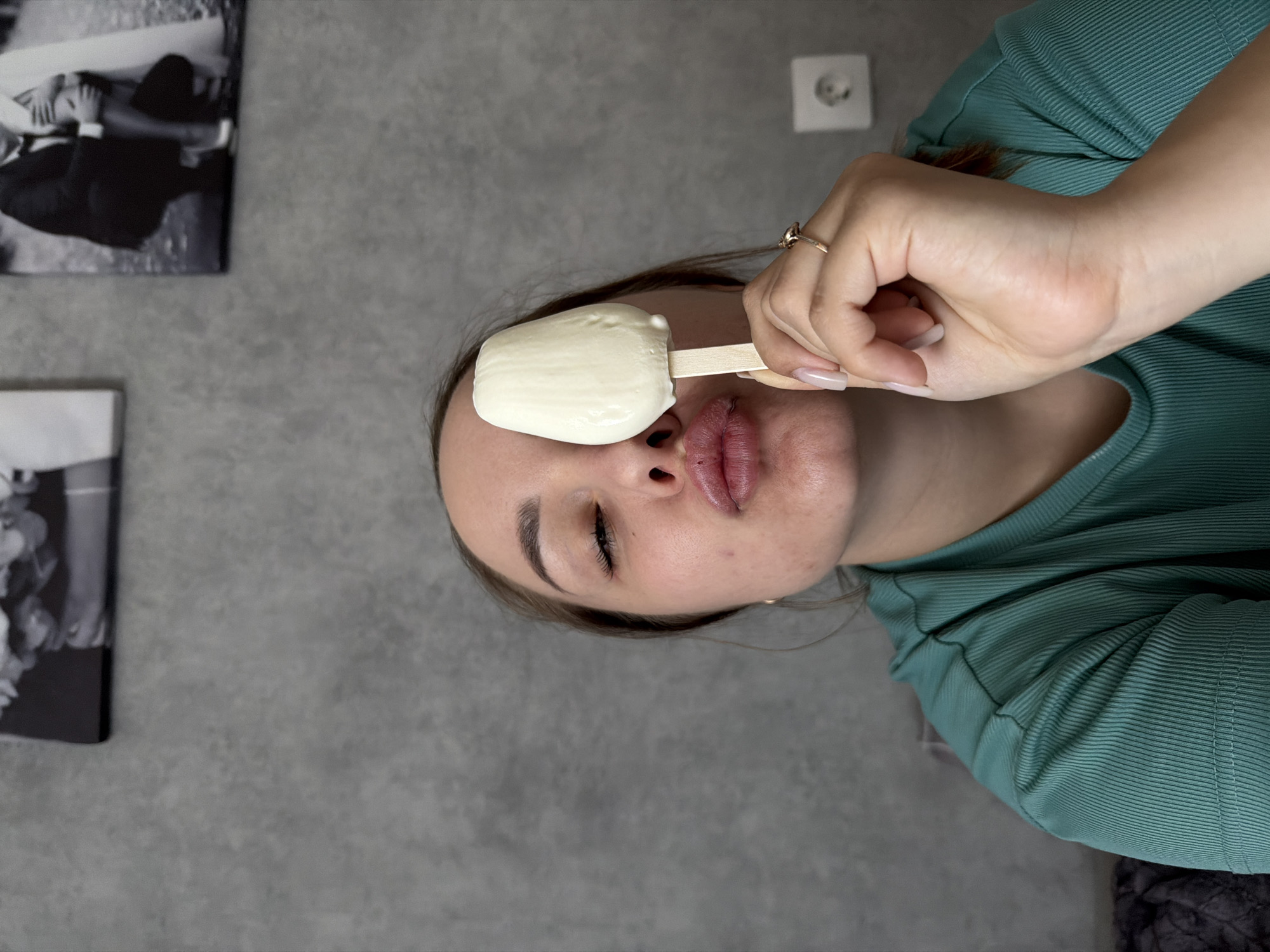 Woman enjoys popsicle in early morning Chaikovsky selfie session