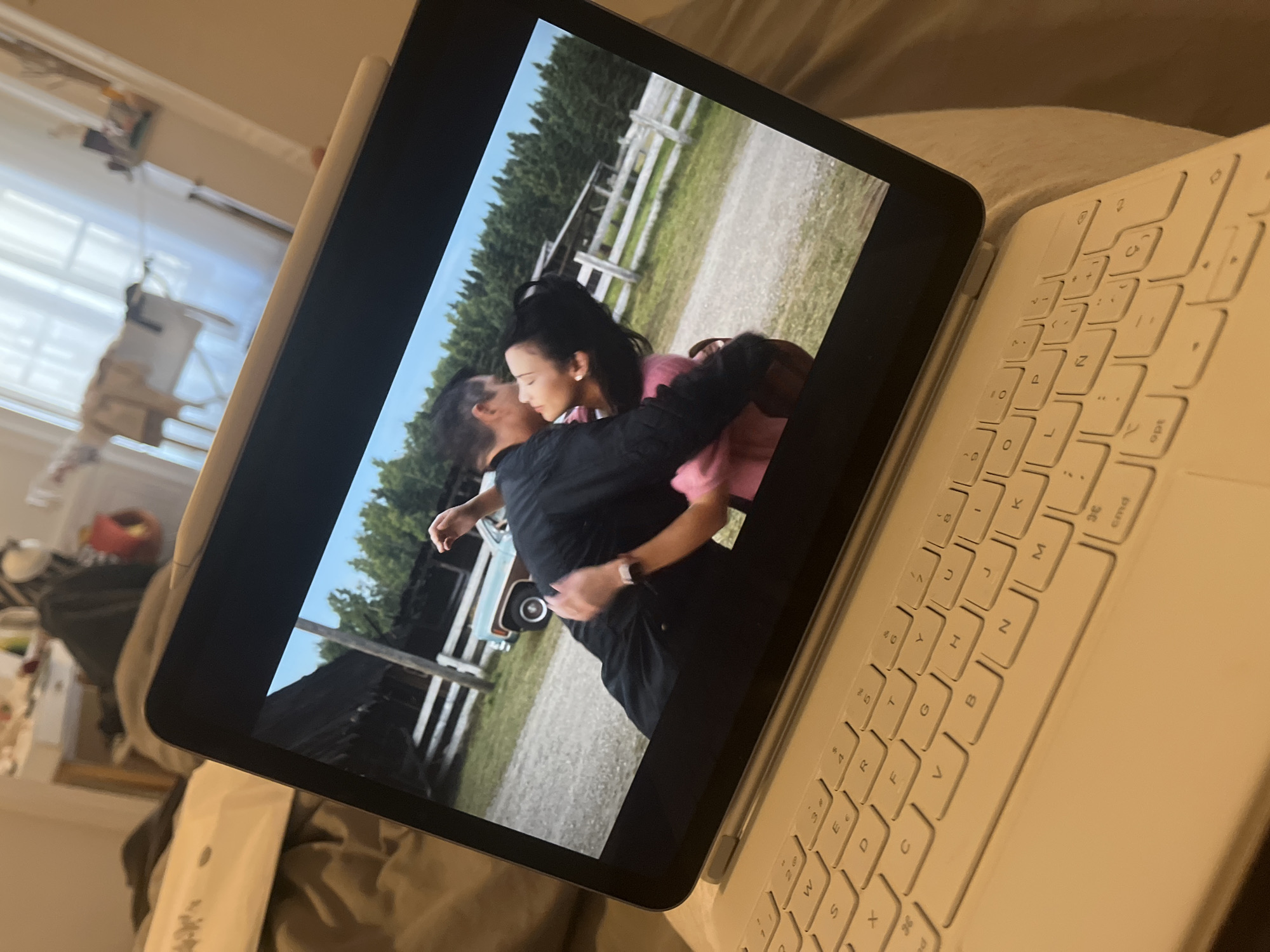 Tablet displays romantic video content in Lyon bedroom setting