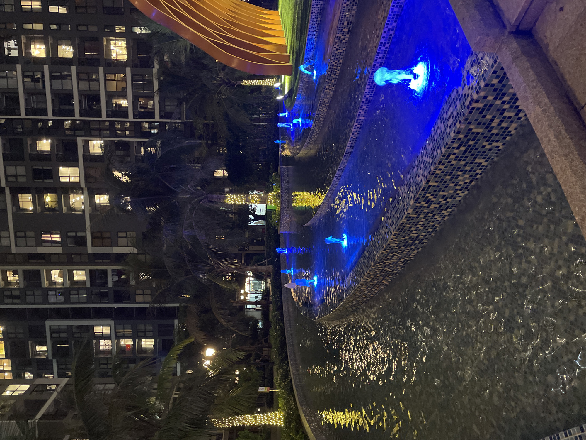 Night stroll through a Hanoi residential complex, flowers and all