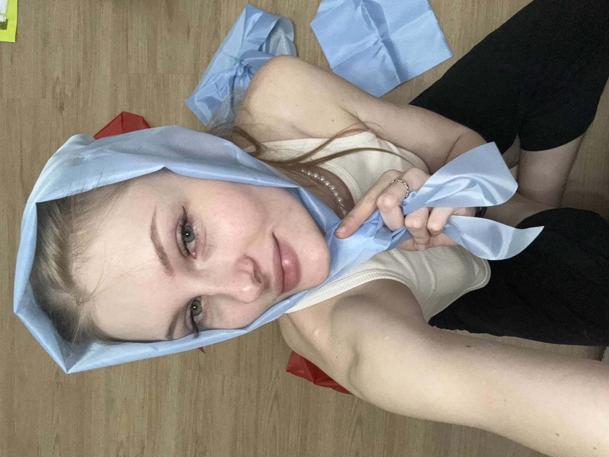 Woman photographed in headscarf photo session in Perm home