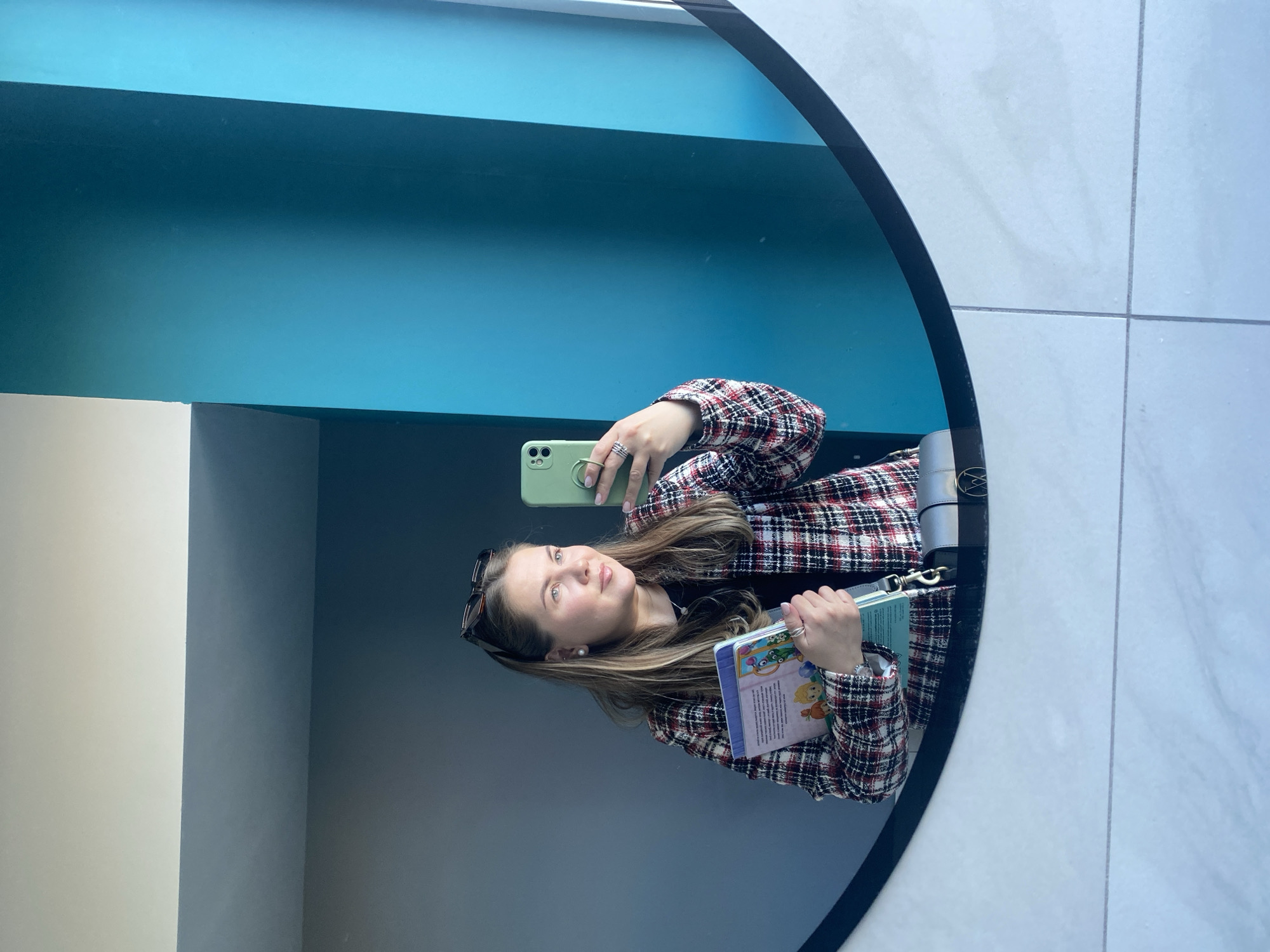 Woman poses for photos at decorated locations in Izhevsk