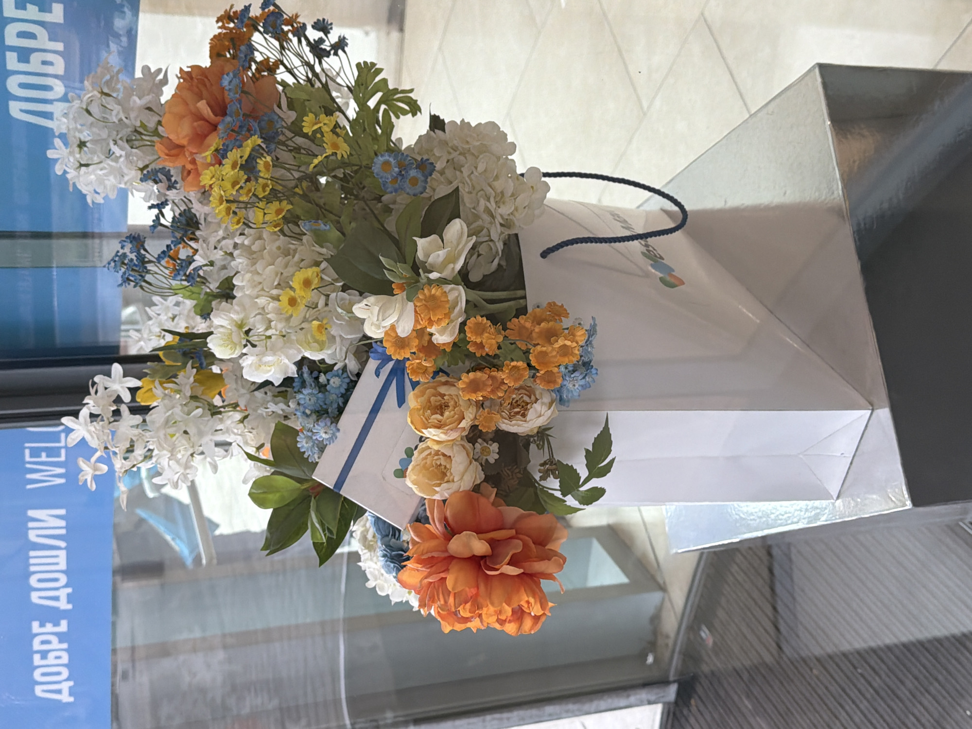 Easter flowers and window display spotted in urban storefront
