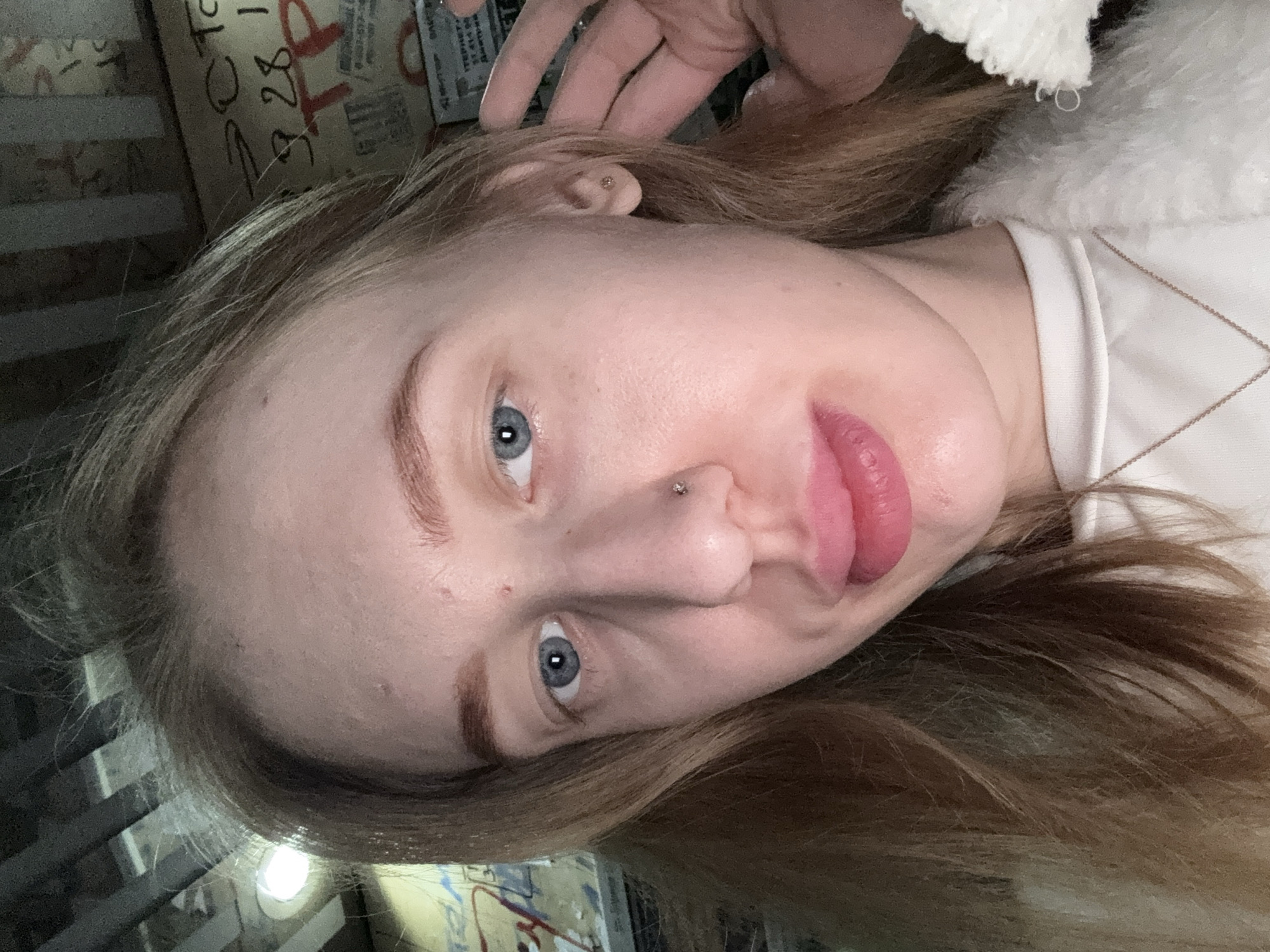 Woman takes selfie in Koysugskiy, Russia early morning