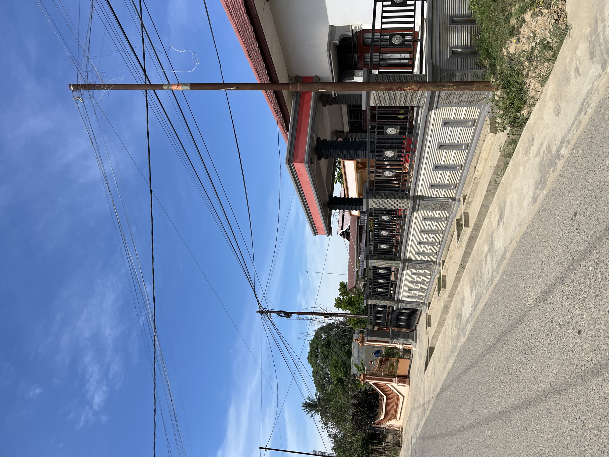 Quiet Indonesian neighborhood streets on a sunny afternoon
