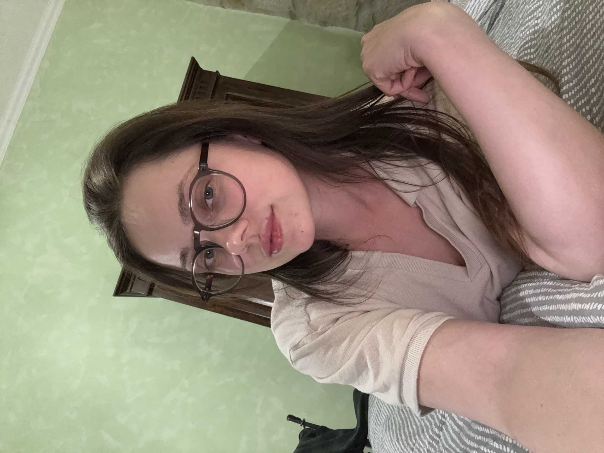 Woman resting indoors captured in Budapest residential setting