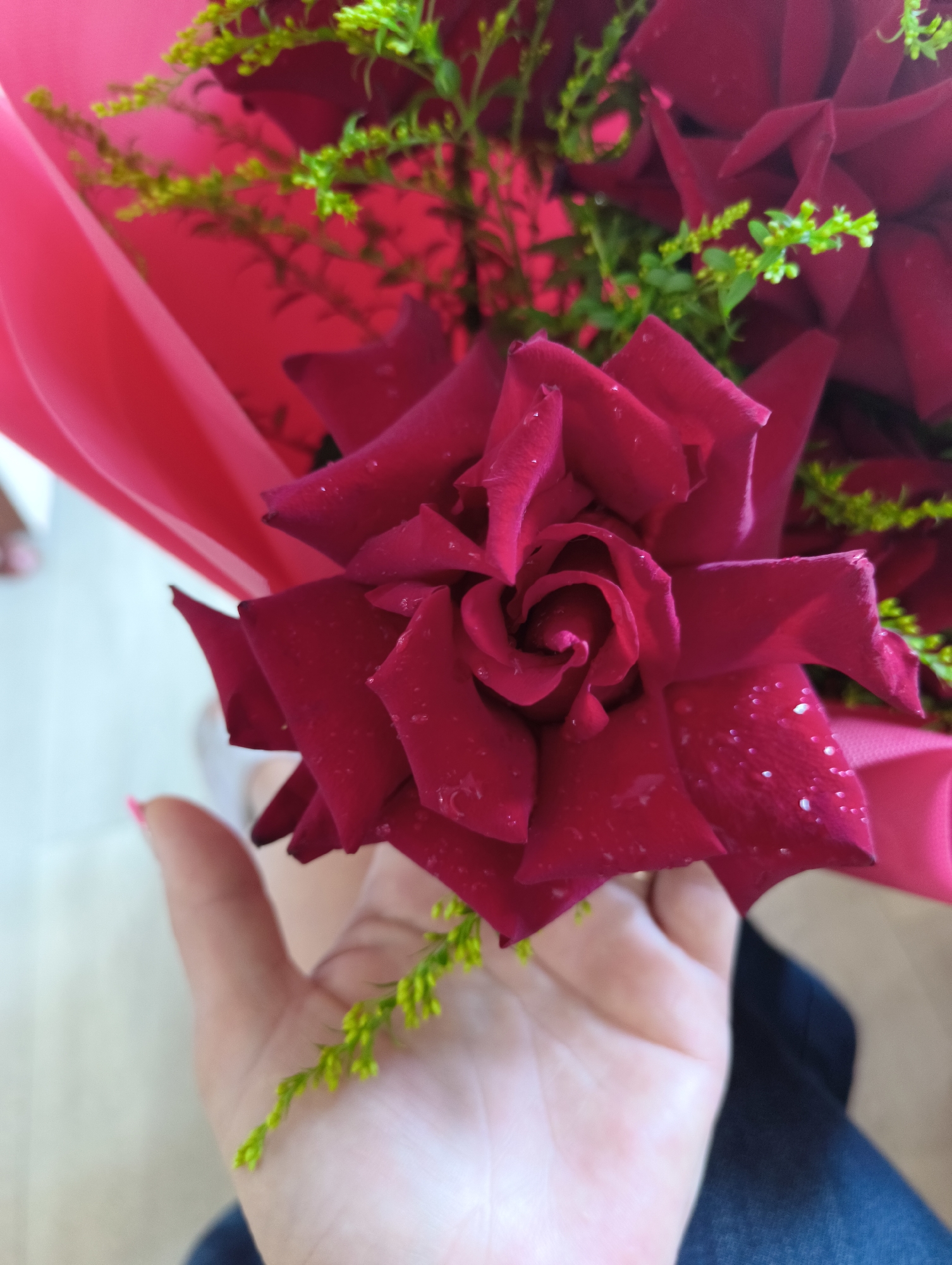 Close-up details of a fresh red rose bouquet