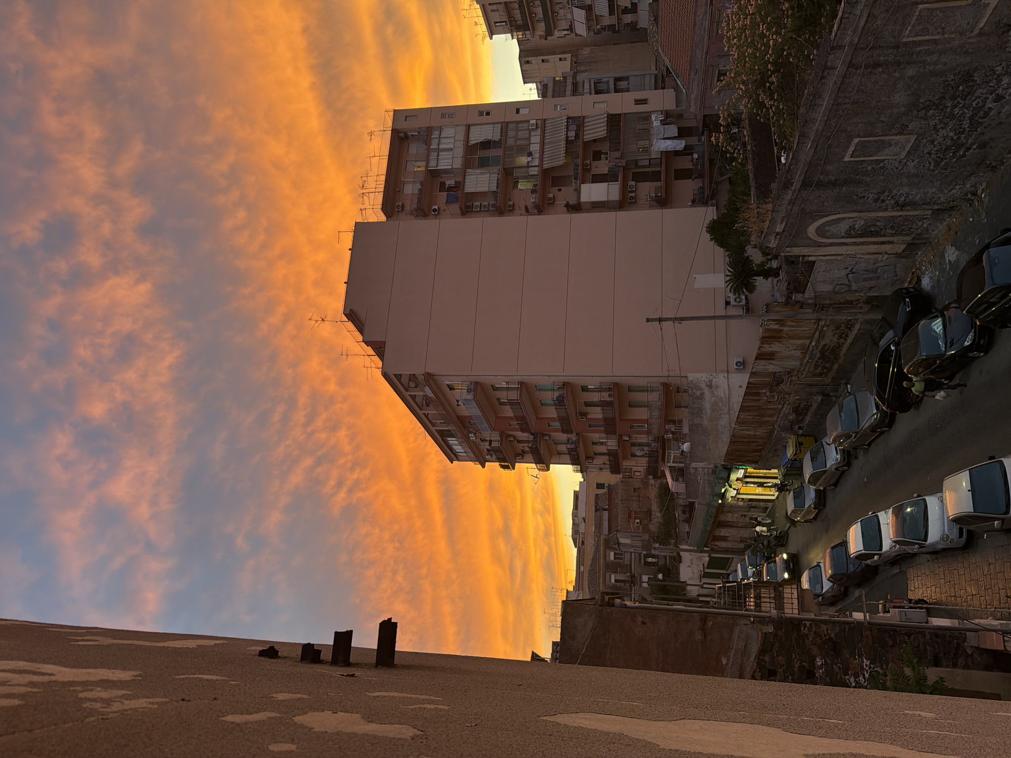 Spectacular sunset illuminates Catania with fireworks, volcanic backdrop