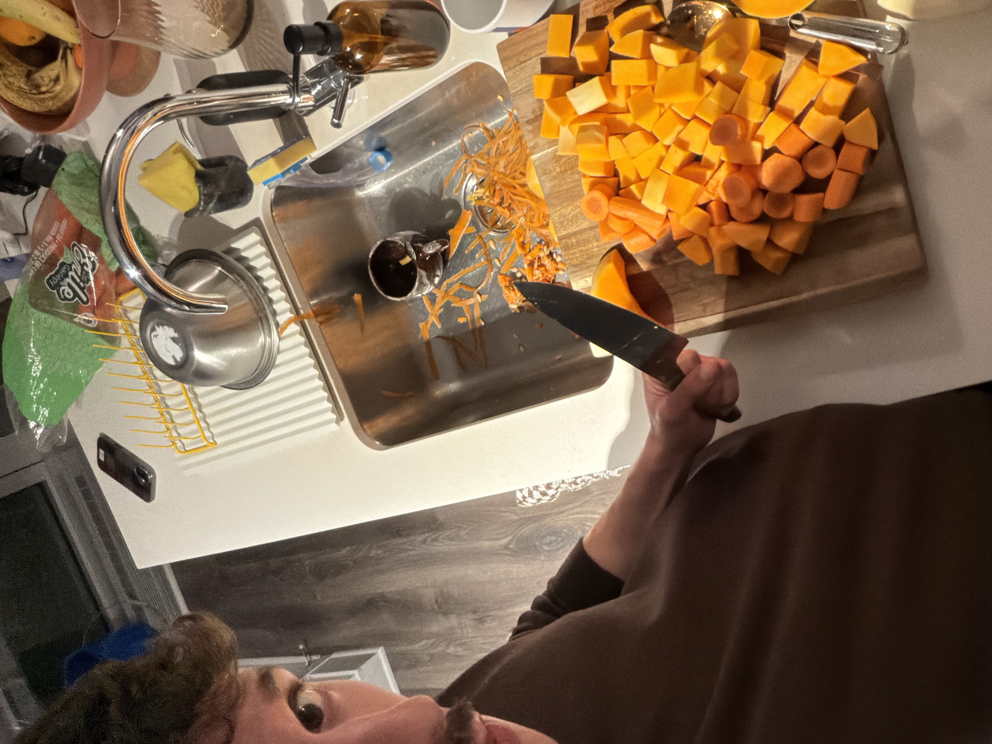 Late-night butternut squash prep captured in Montreal kitchen
