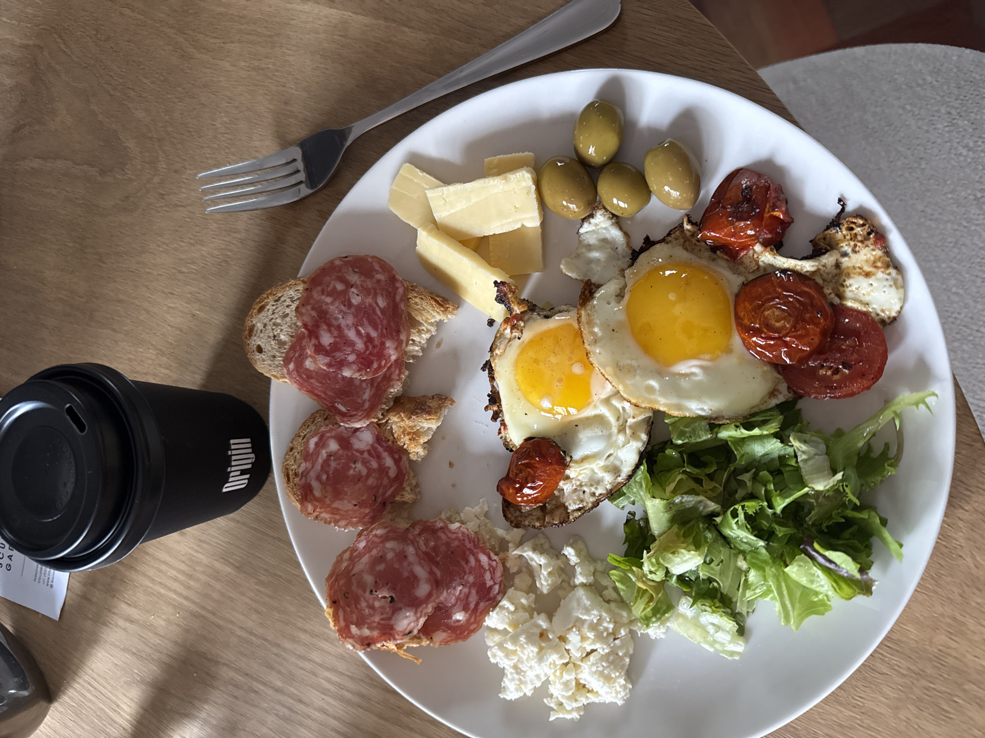 Breakfast documented at Cape Town restaurant featuring local coffee