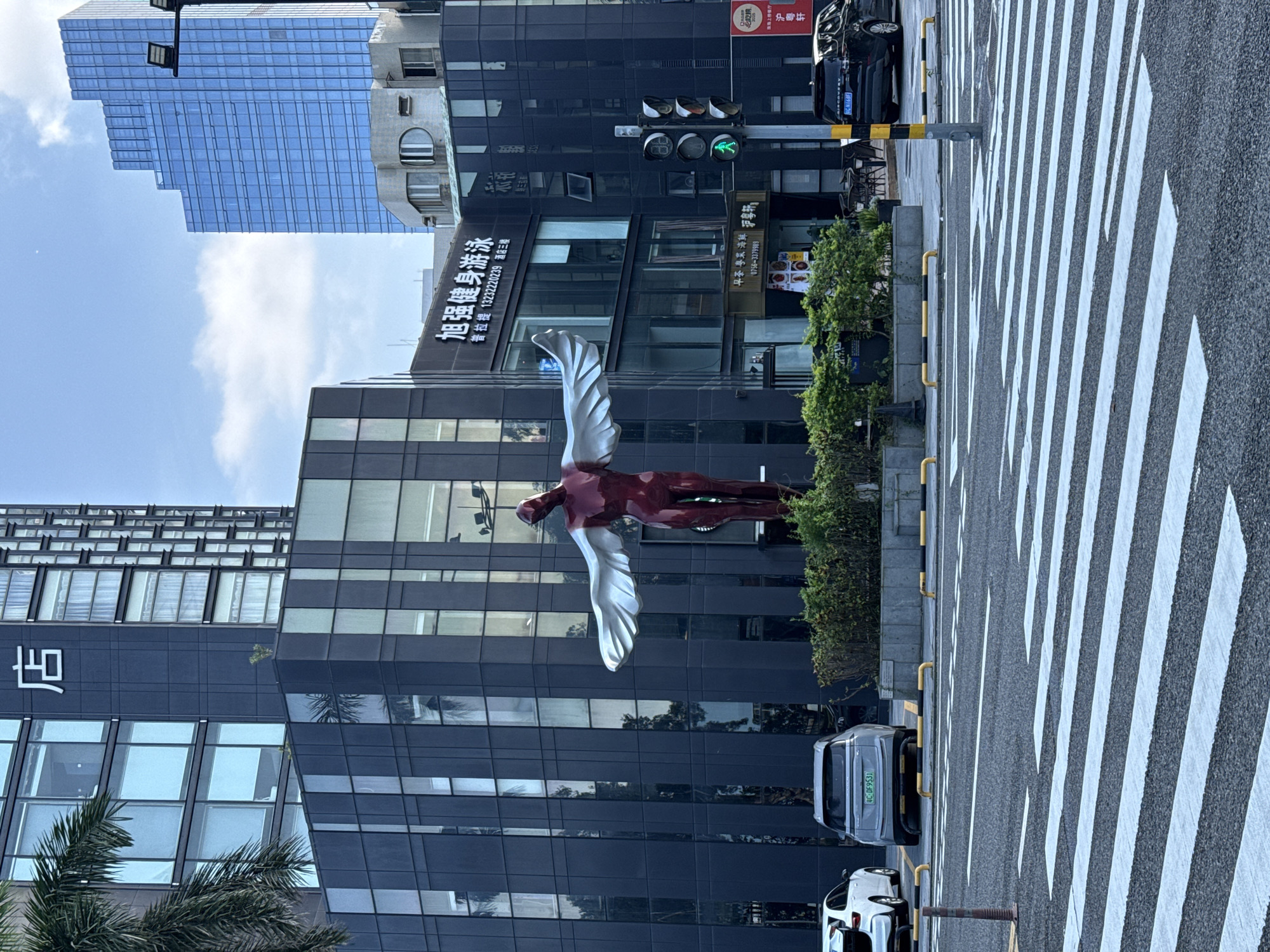 Winged sculpture spotted in Xiangzhou urban landscape