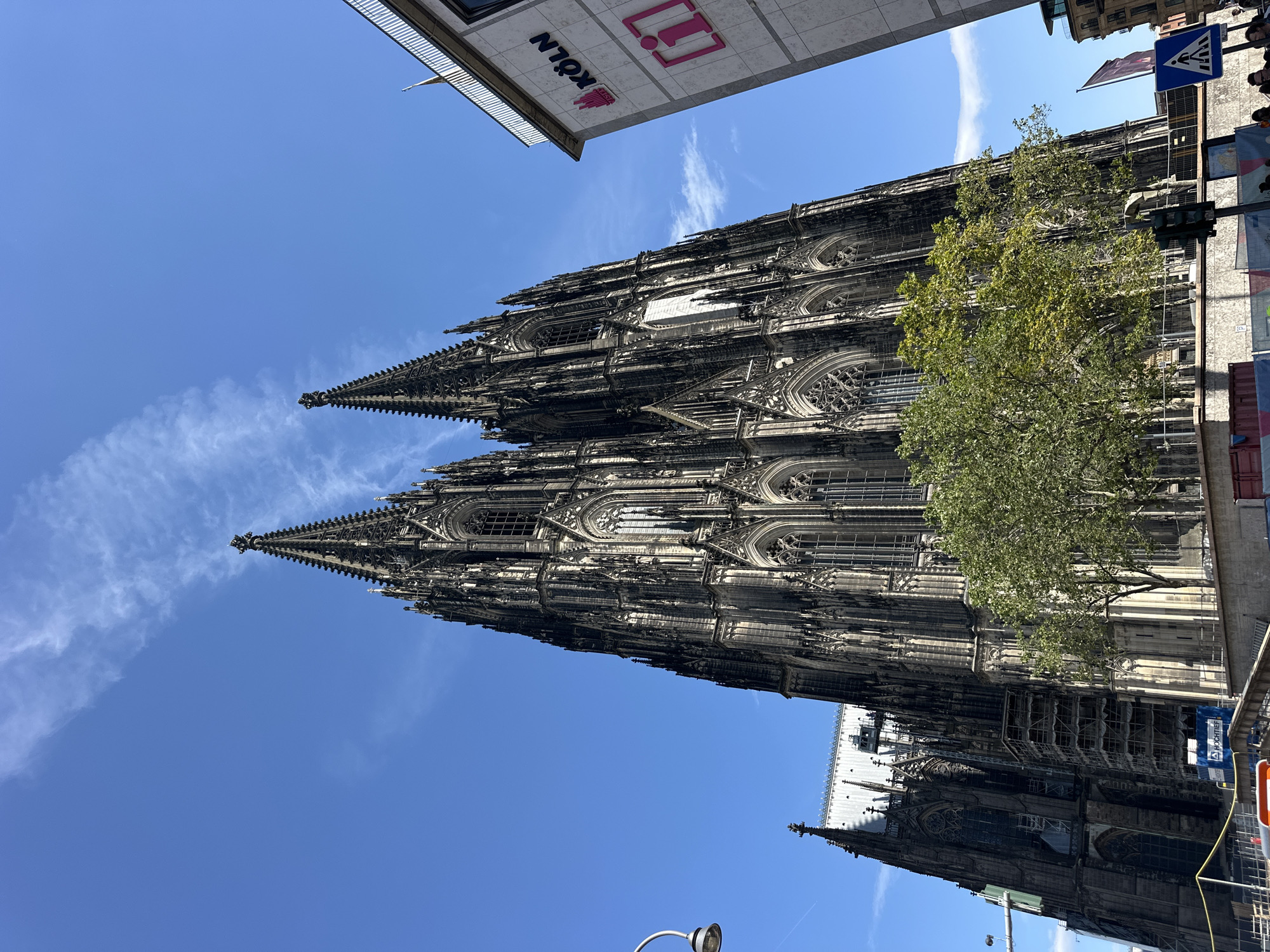 Street-level moments around Cologne Cathedral on a summer afternoon