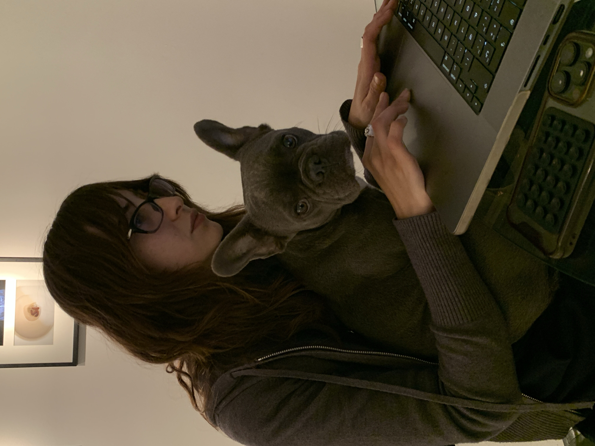 Woman and French Bulldog Share Quiet Evening in Buenos Aires