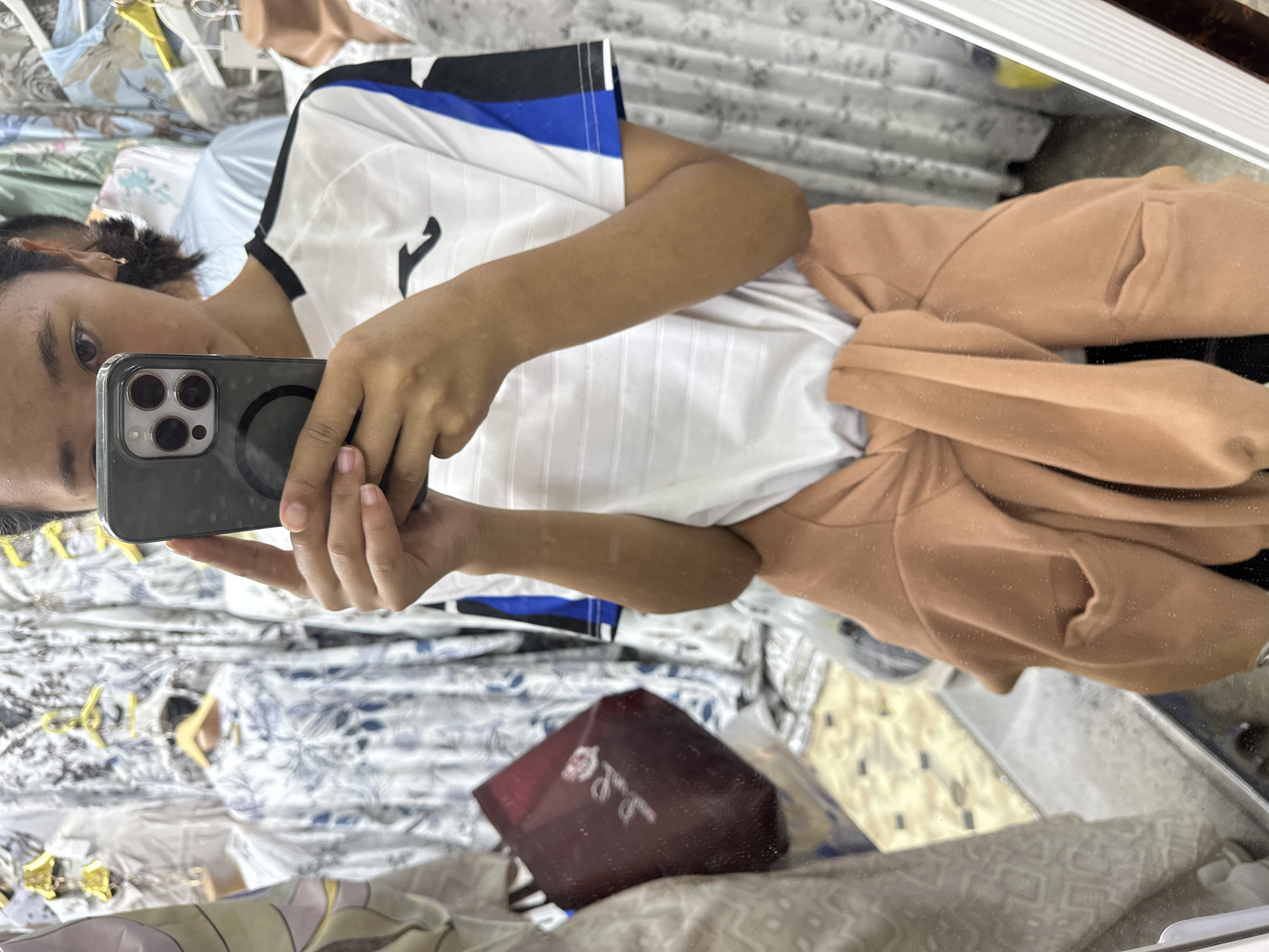 Morning market run through Kara-Suu's busy clothing bazaar