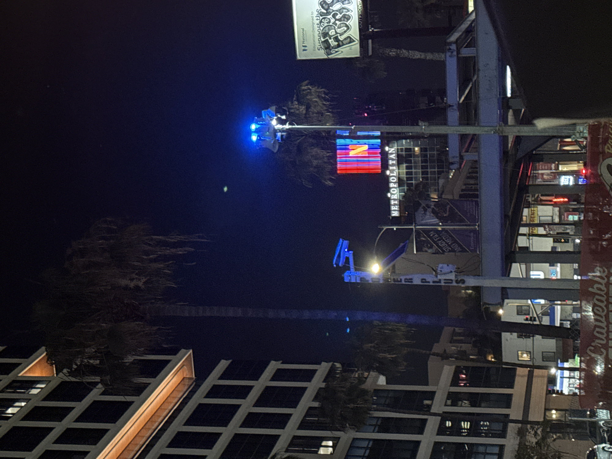 Netflix logo illuminates Los Angeles Metropolitan building at night